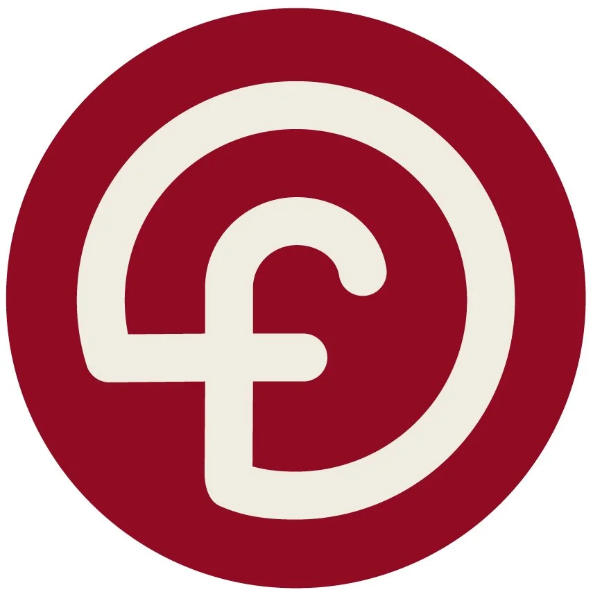 Red circular logo with a white