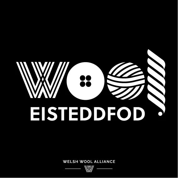 Graphic design featuring the word "WOOD" with each letter styled uniquely, and the phrase "EISTEDDFOD" below, with a small Welsh Wool Alliance logo at the bottom.