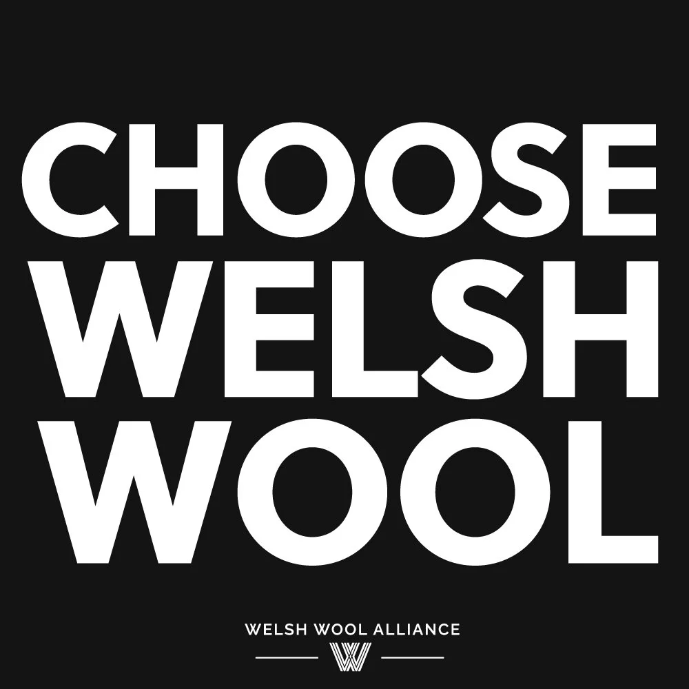 Black background with white text reading 'CHOOSE WELSH WOOL' and a small logo at the bottom that says 'Welsh Wool Alliance'.