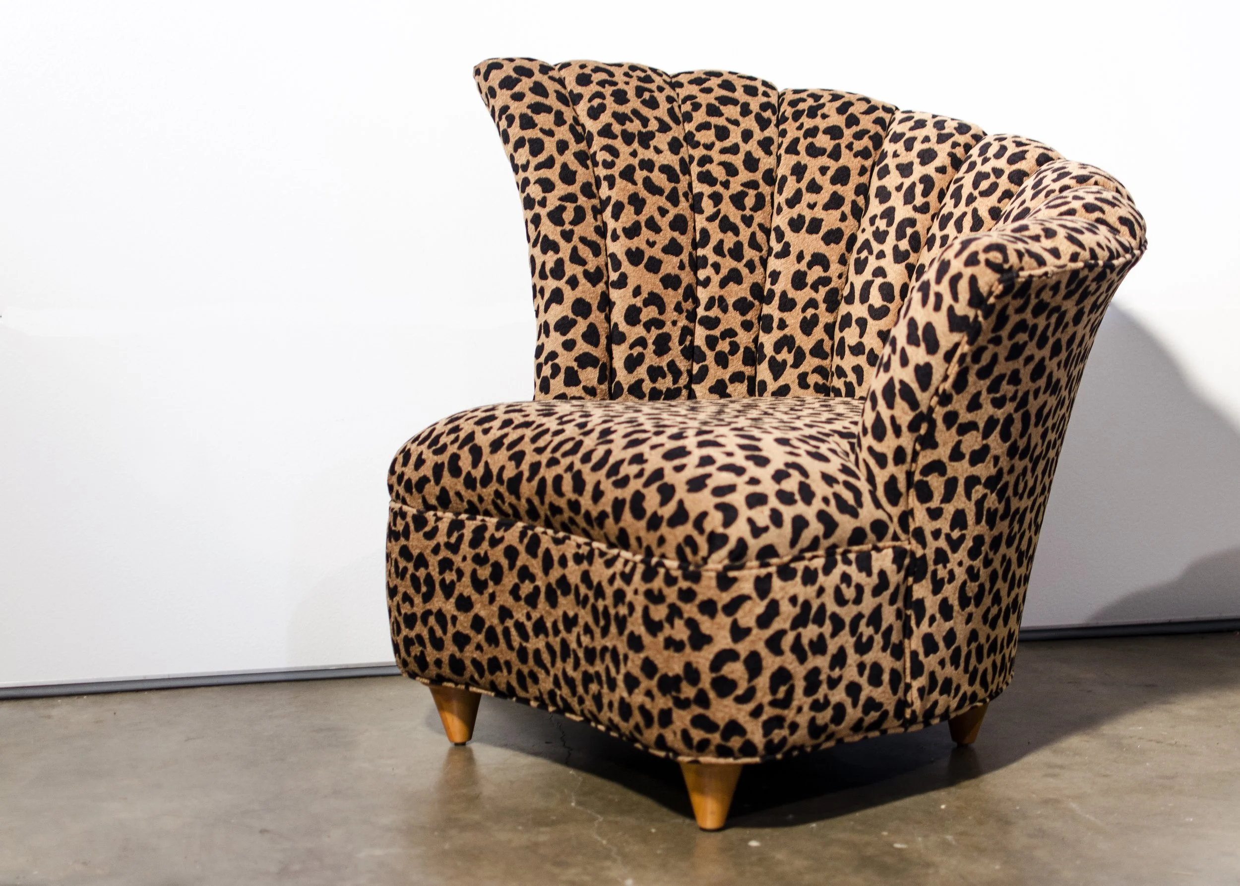 leopard-print-channel-back-asymetrical-chair.jpg