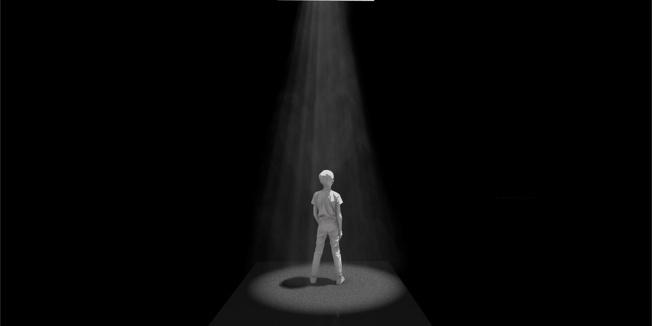 A person stands alone on a small illuminated stage in a dark room, with a spotlight shining down from above, casting a shadow on the floor.