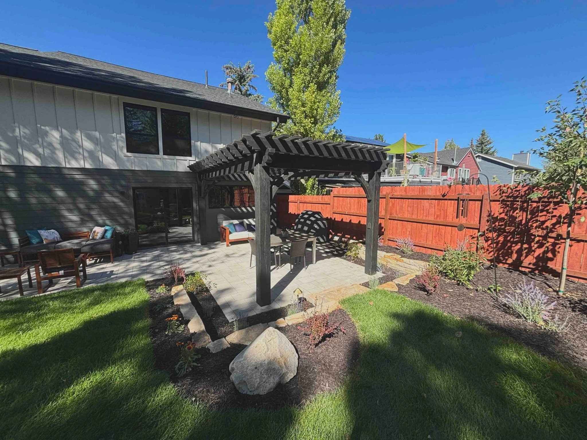 custom pergola and paver patio
