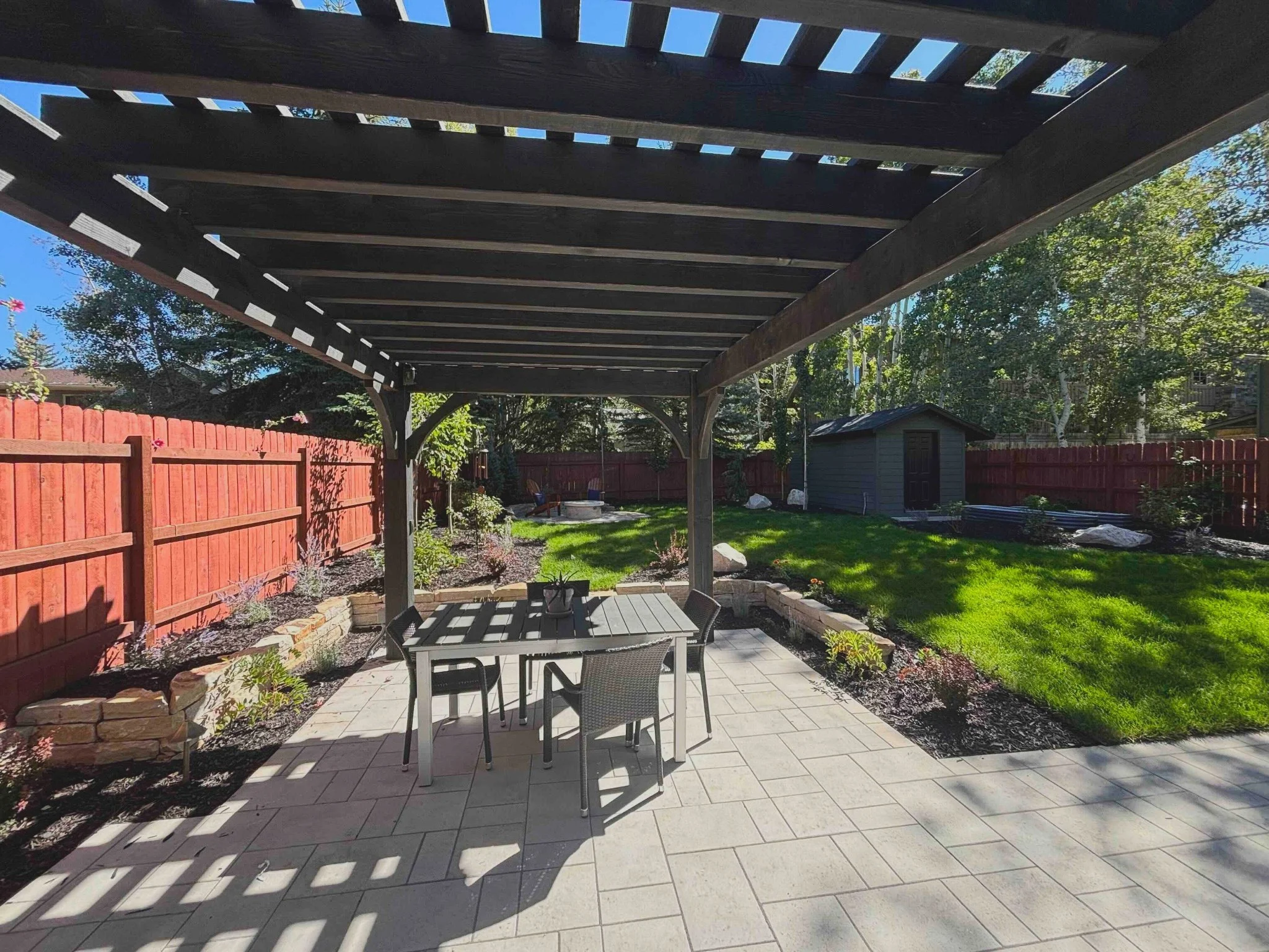 custom pergola and paver patio