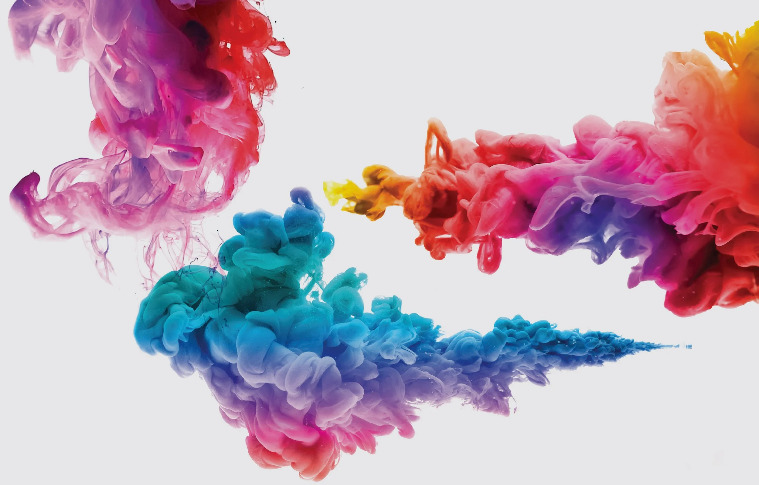 Image of colourful ink spreading into water