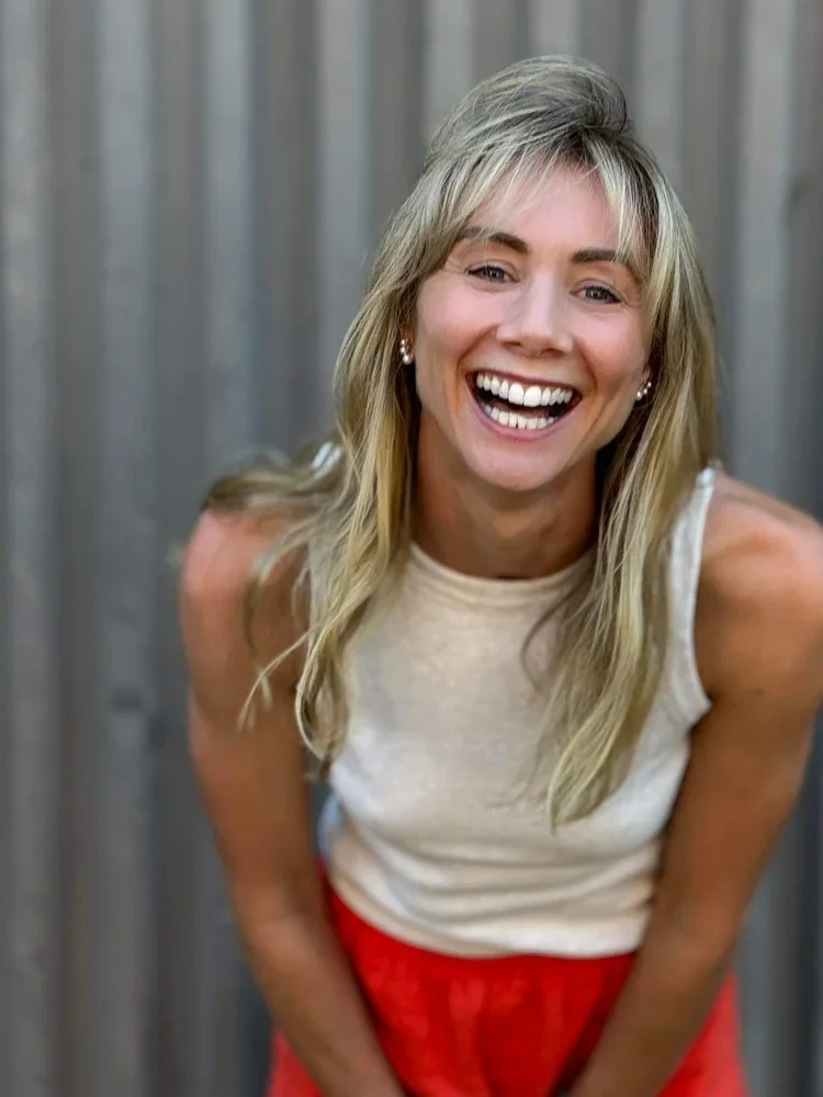Dr. Edel Langan, performance psychologist and coach, smiling warmly