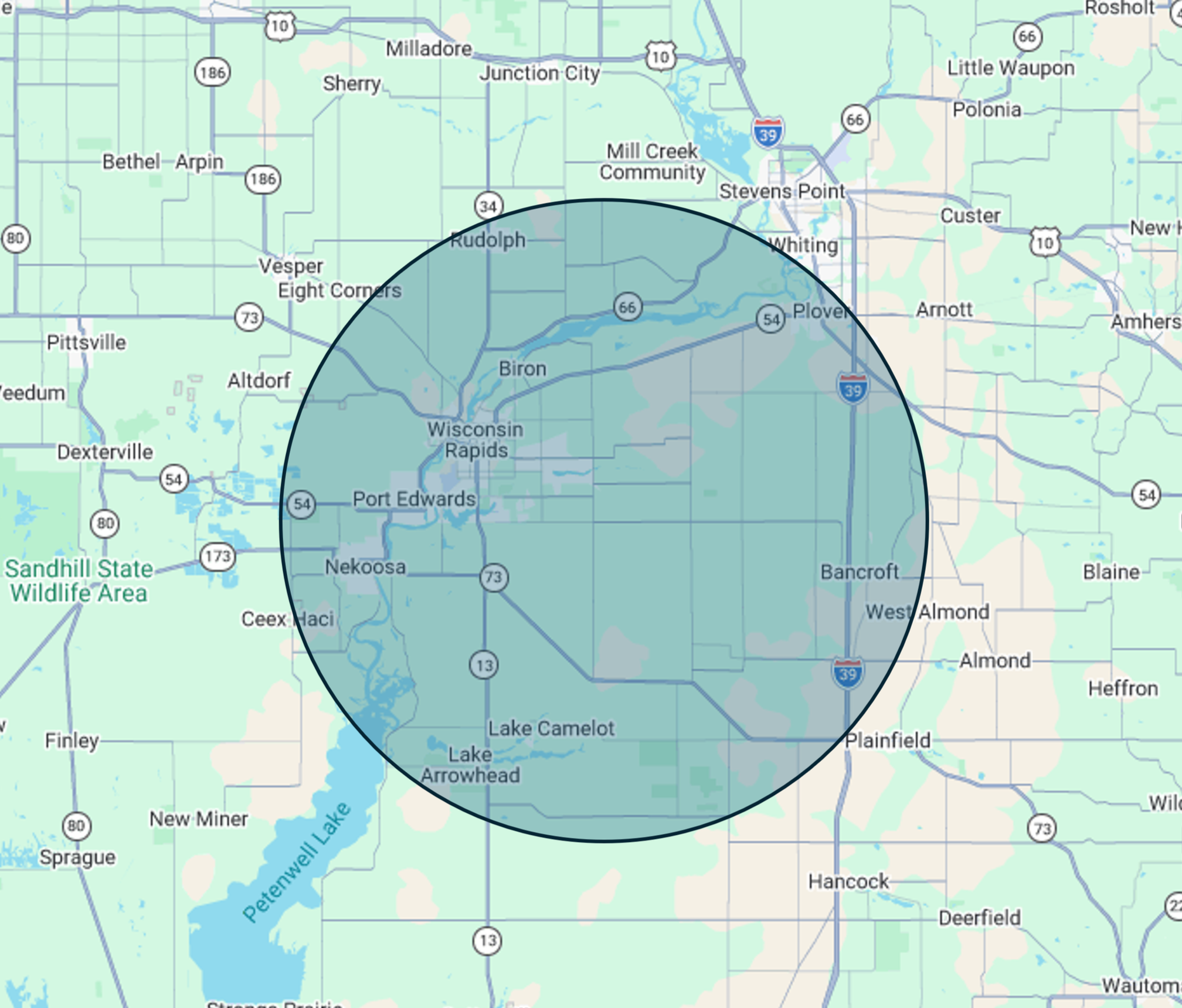 Map showing a highlighted circular area around several towns including Wisconsin Rapids, Port Edwards, Necedah, and Lake Camelot in Wisconsin.