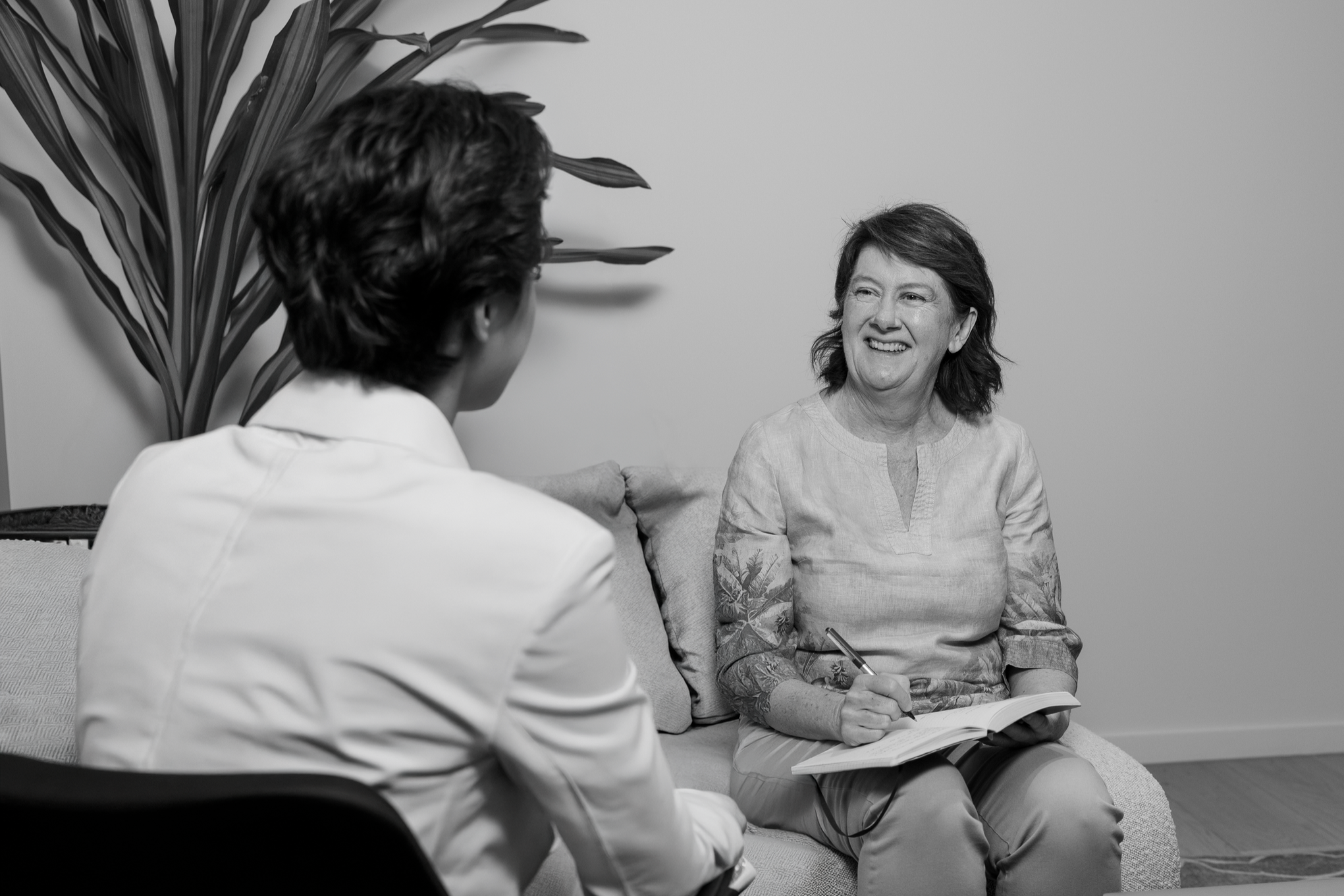 Danette Fenton-Menzies speaking with a client during a coaching session