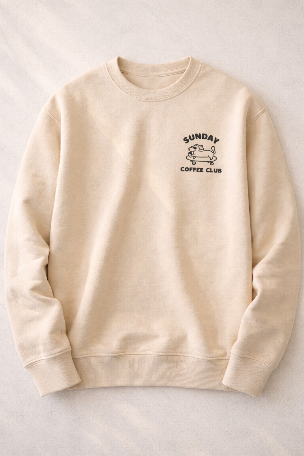 Sweatshirt with 'Sunday Coffee Club' logo.png