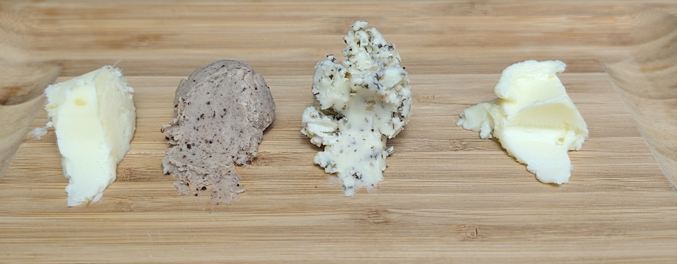 Lake and Churn four flavor options: Lemon Honey, Cinnamon Sugar, Garlic Herb, and Plain compound butter