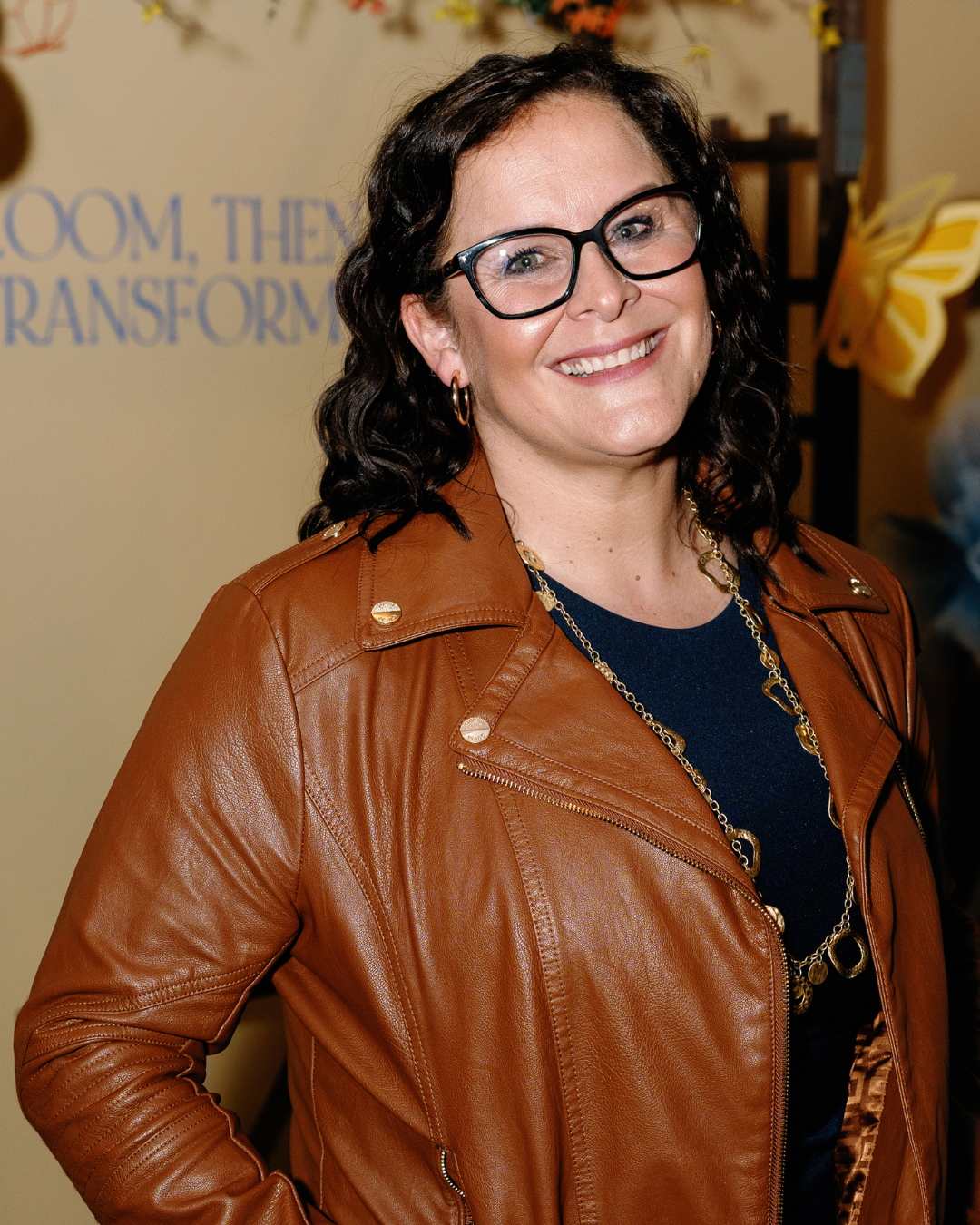 Portrait of April Garcia, occupational therapy professional, travel advisor, and co-founder of Be Brave Travel Academy.