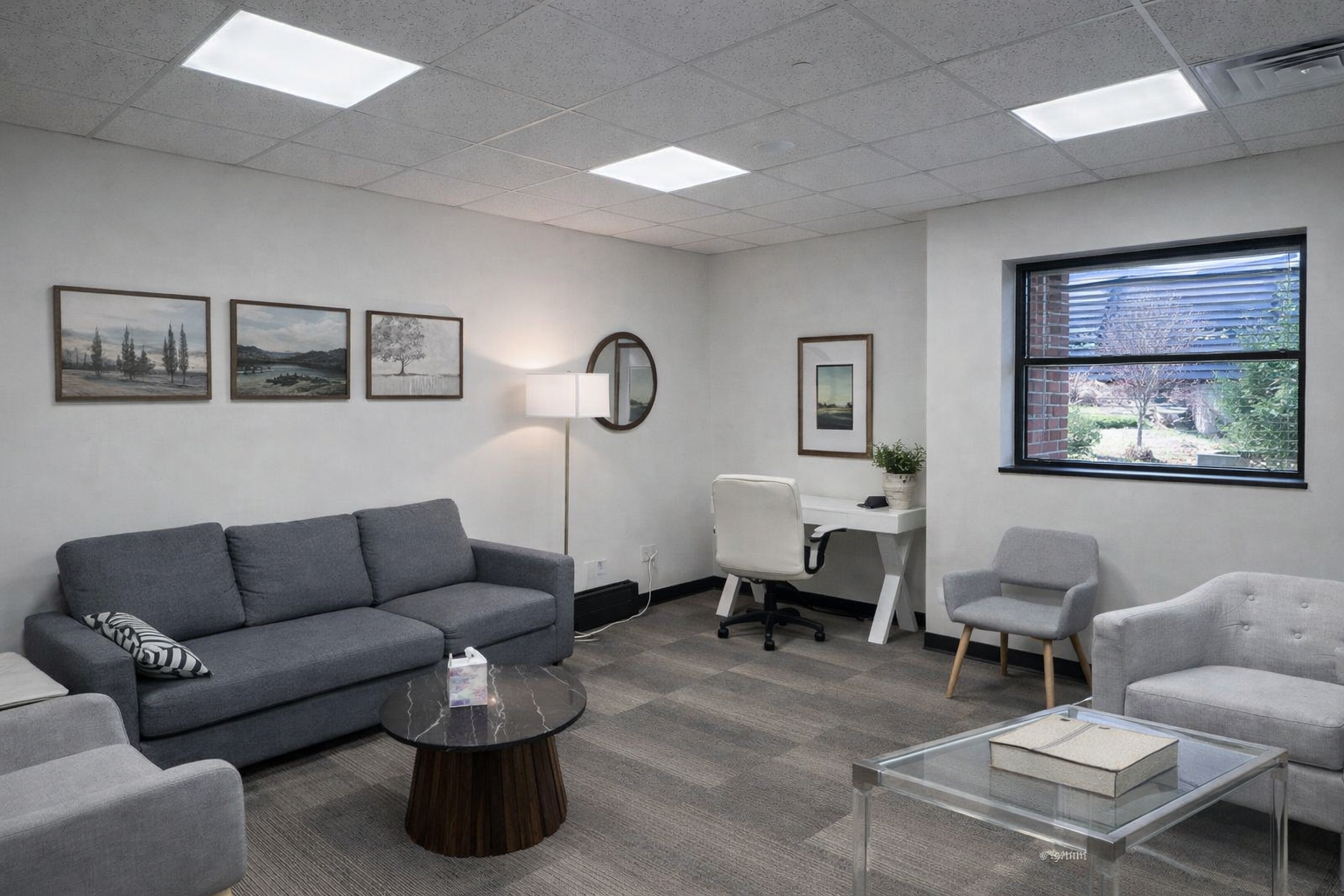 office interior renovation with drywall finishing, painting, ceiling work and lighting fixture installation