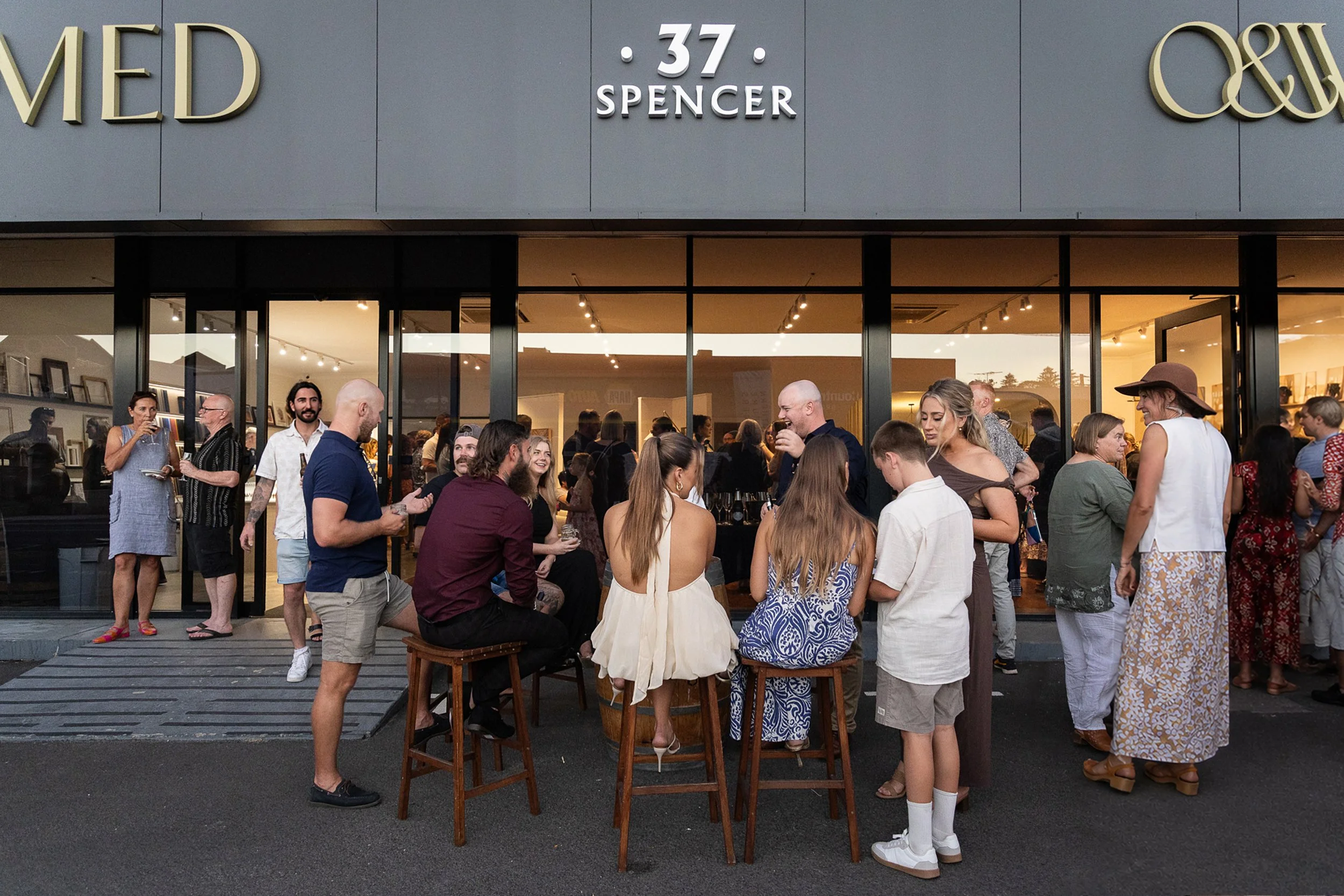 Guests gathering outside the 37 Spencer creative precinct during a community event hosted by Framed in Bunbury.