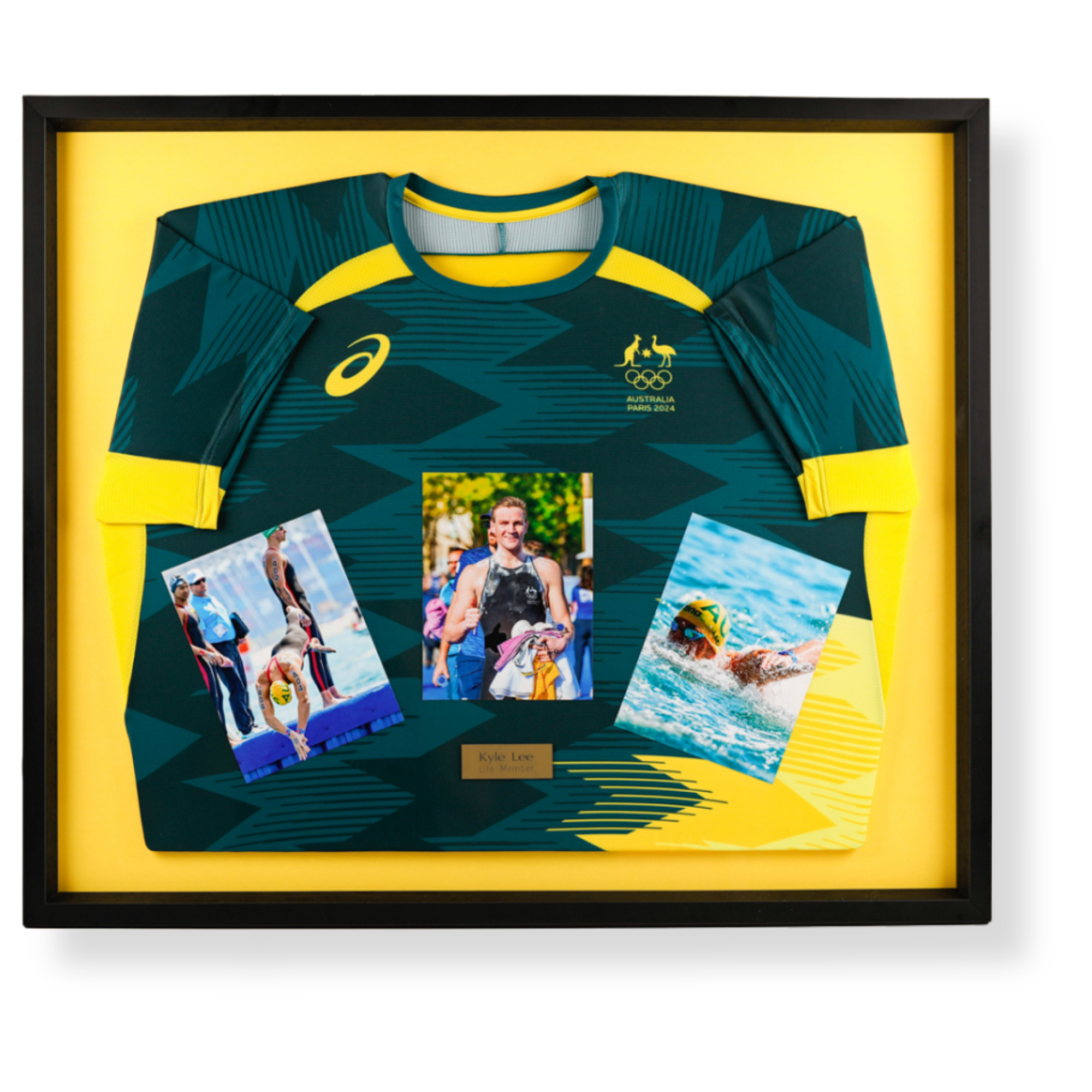 Custom framed Australian Olympic team jersey display commemorating Kyle Lee life membership with athlete photographs and Olympic memorabilia.