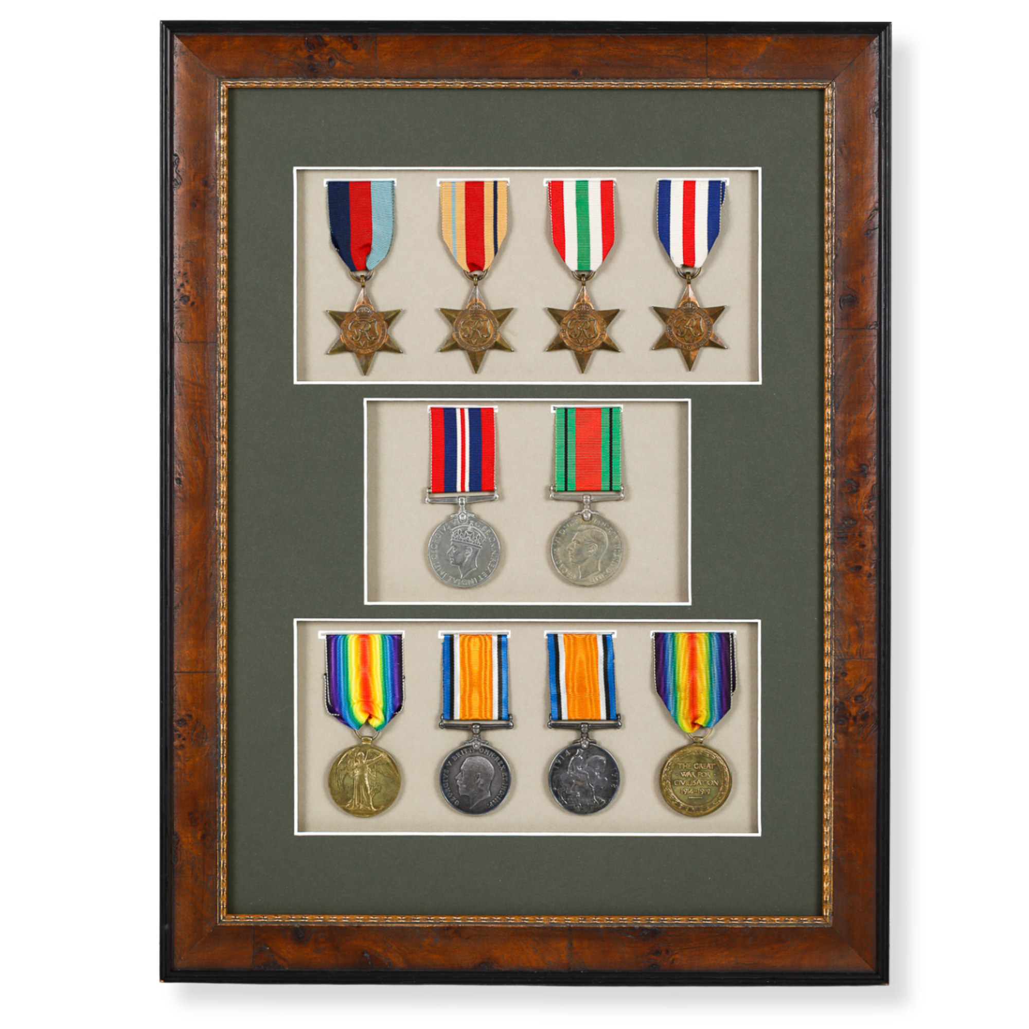 Custom framed military medal display featuring mounted service medals and ribbons.