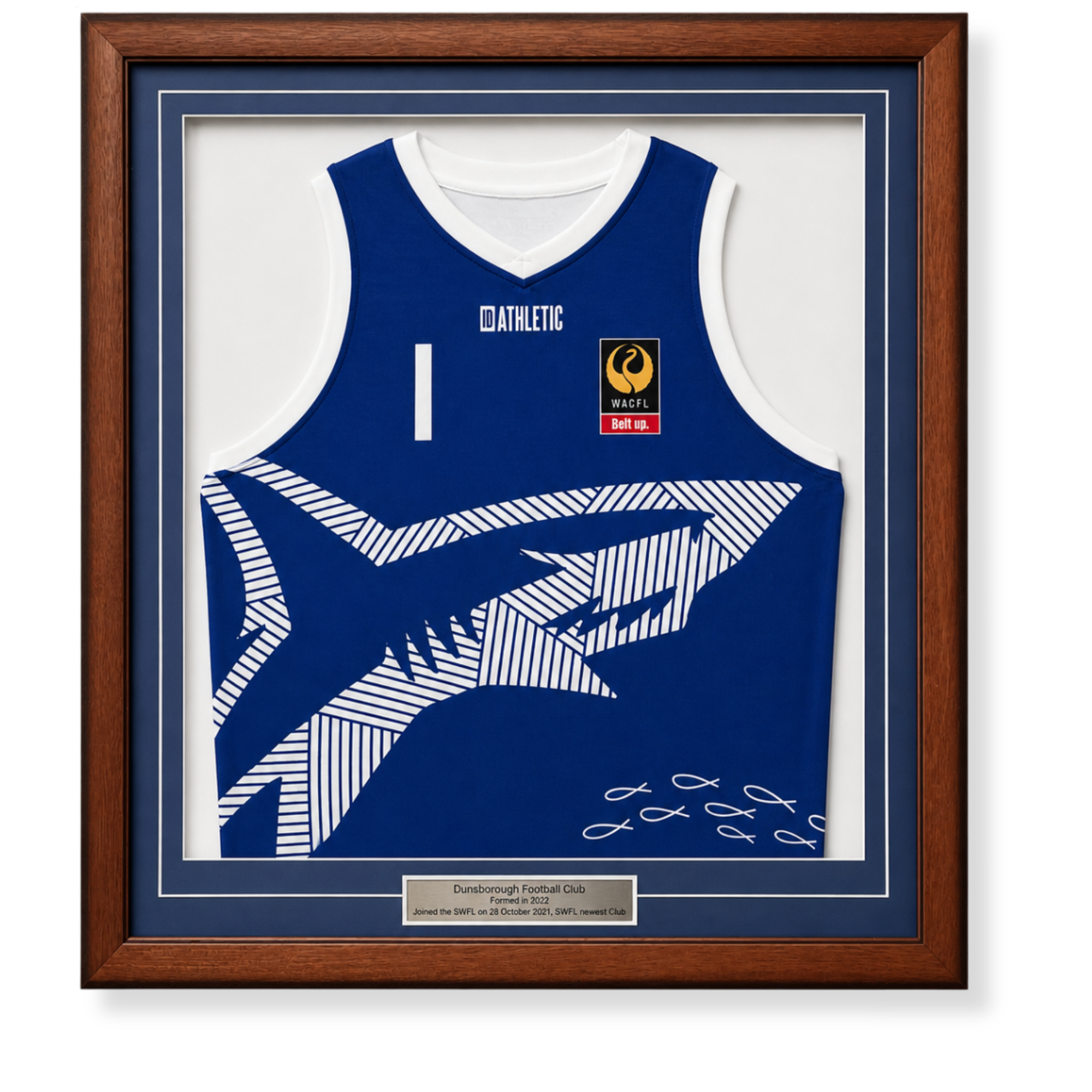 Custom framed football jersey display featuring Dunsborough Football Club memorabilia and plaque.