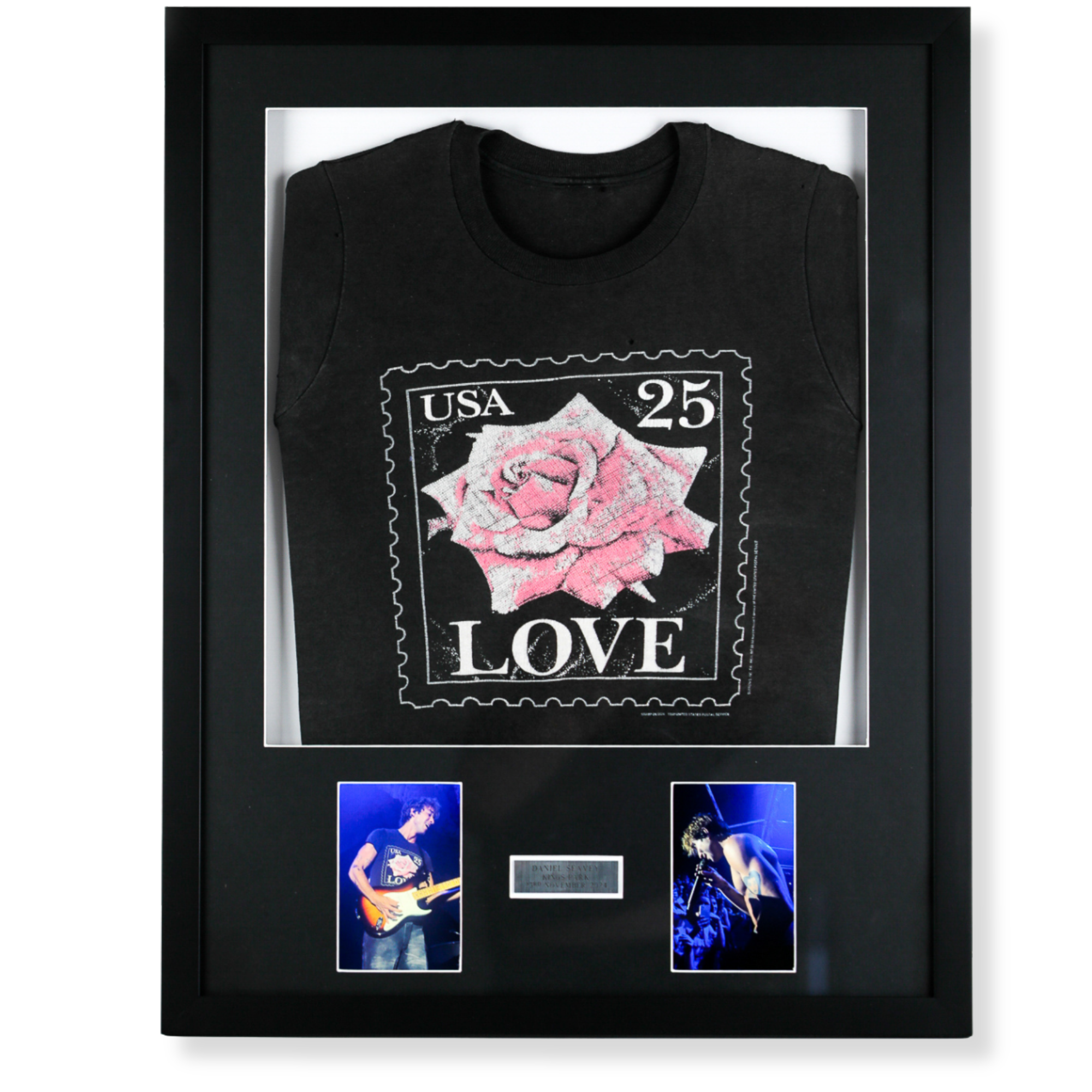 Custom framed music memorabilia display featuring band tshirt, photos and commemorative plaque. 