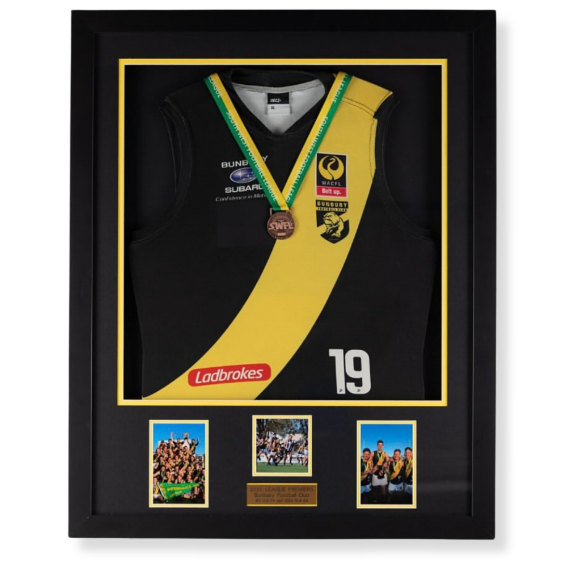 Custom sports memorabilia framing featuring Bunbury Bulldogs football jersey, medals and premiership team photographs.