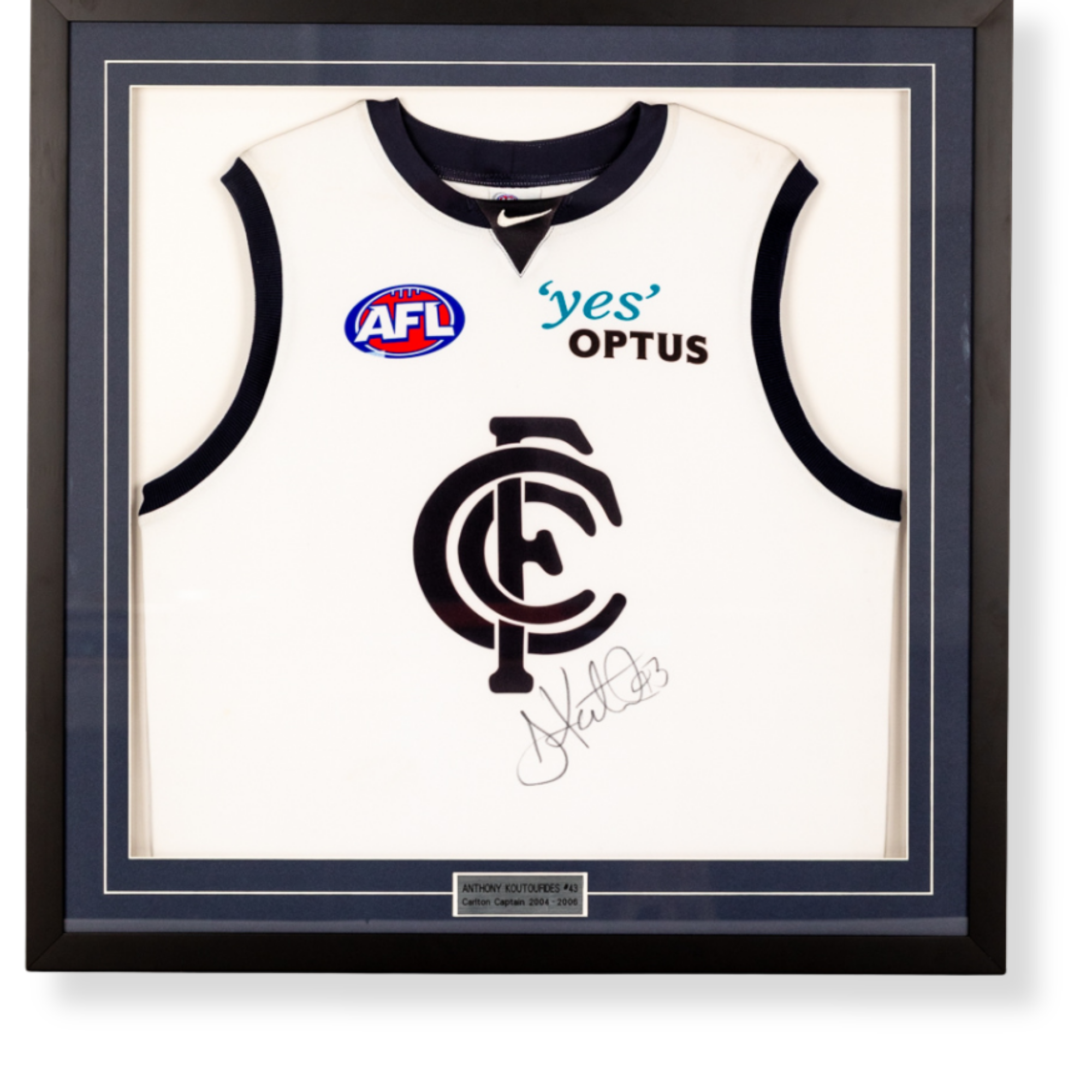 Custom framed signed Anthony Koutoufides Carlton Football Club AFL jersey display with commemorative plaque.