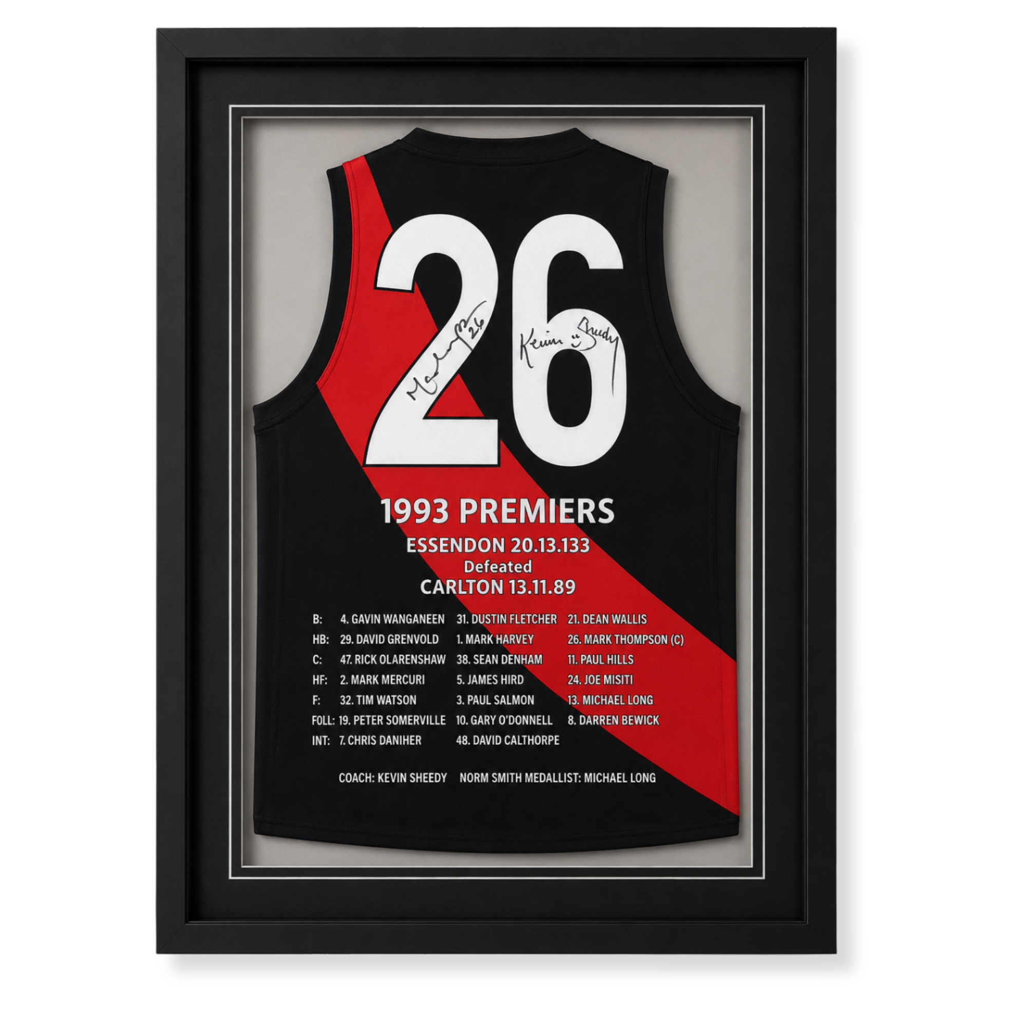 Custom framed signed Essendon Bombers AFL jersey display featuring team roster and coach commemorative details.