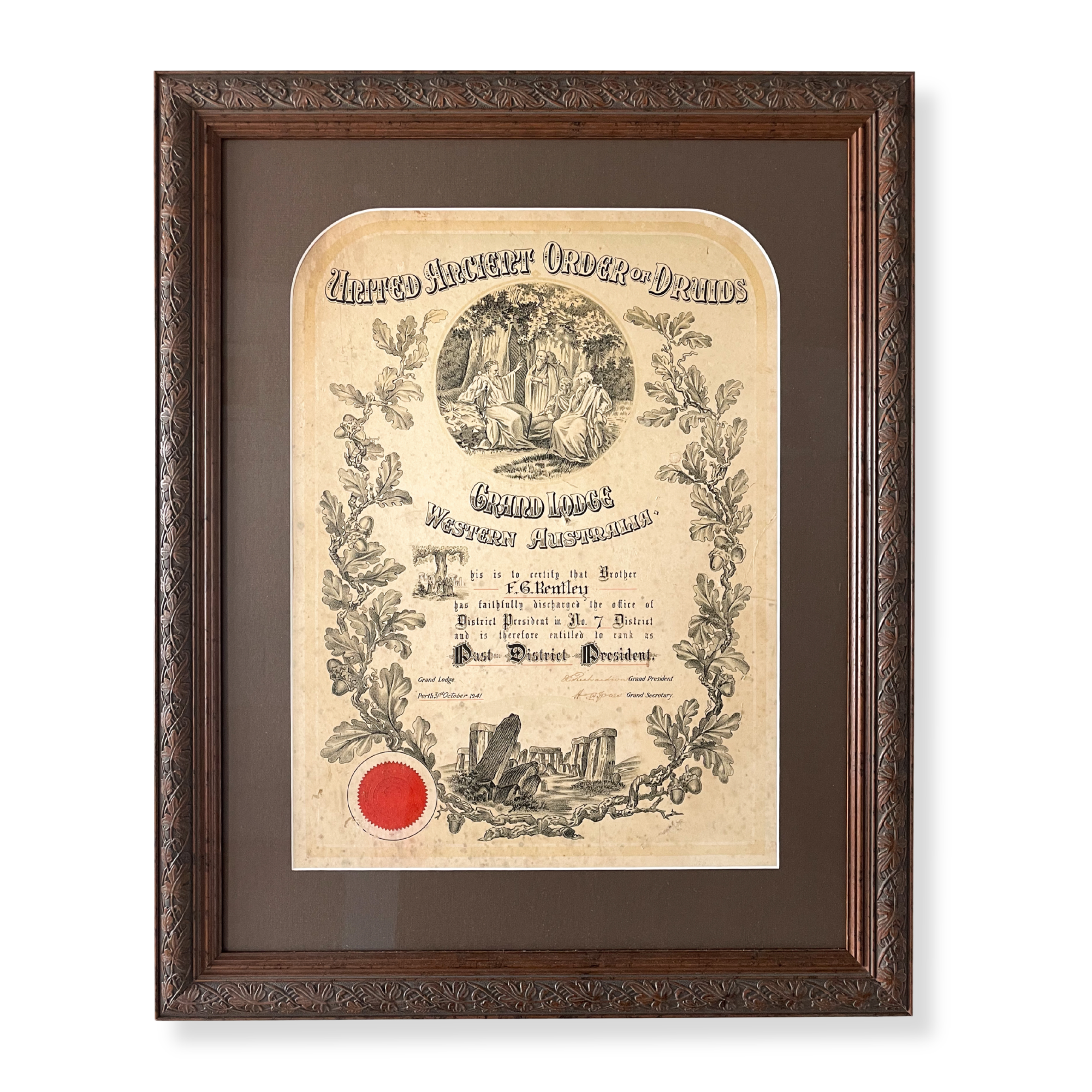Framed historical certificate from the United Ancient Order of Druids featuring decorative typography, Stonehenge illustration, and official seal.