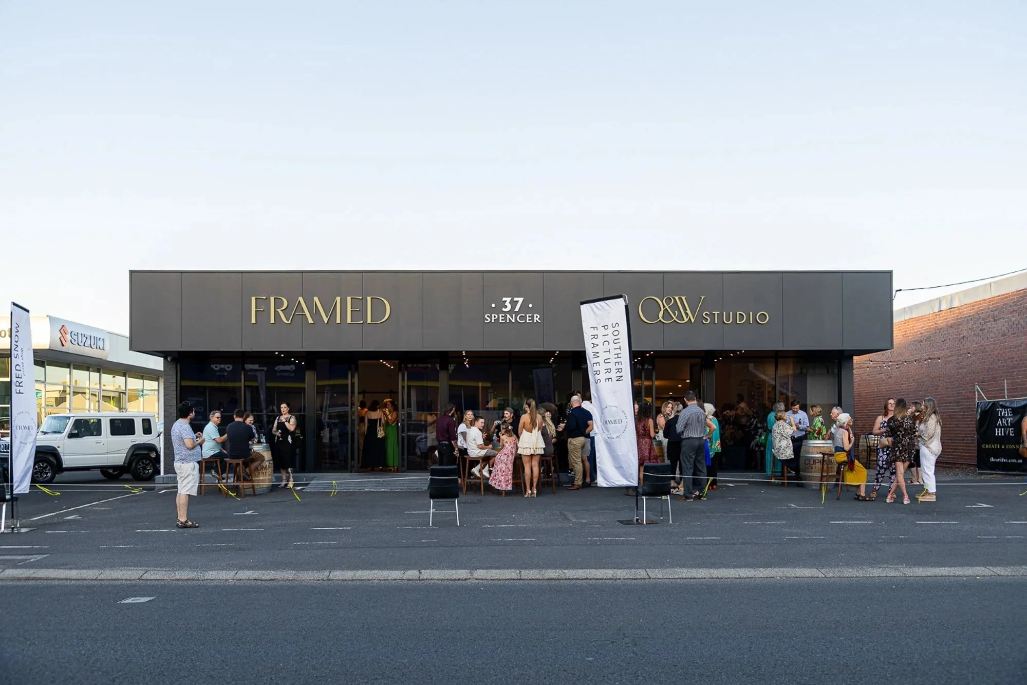 People socialising outside Framed Bunbury at the 37 Spencer launch night event