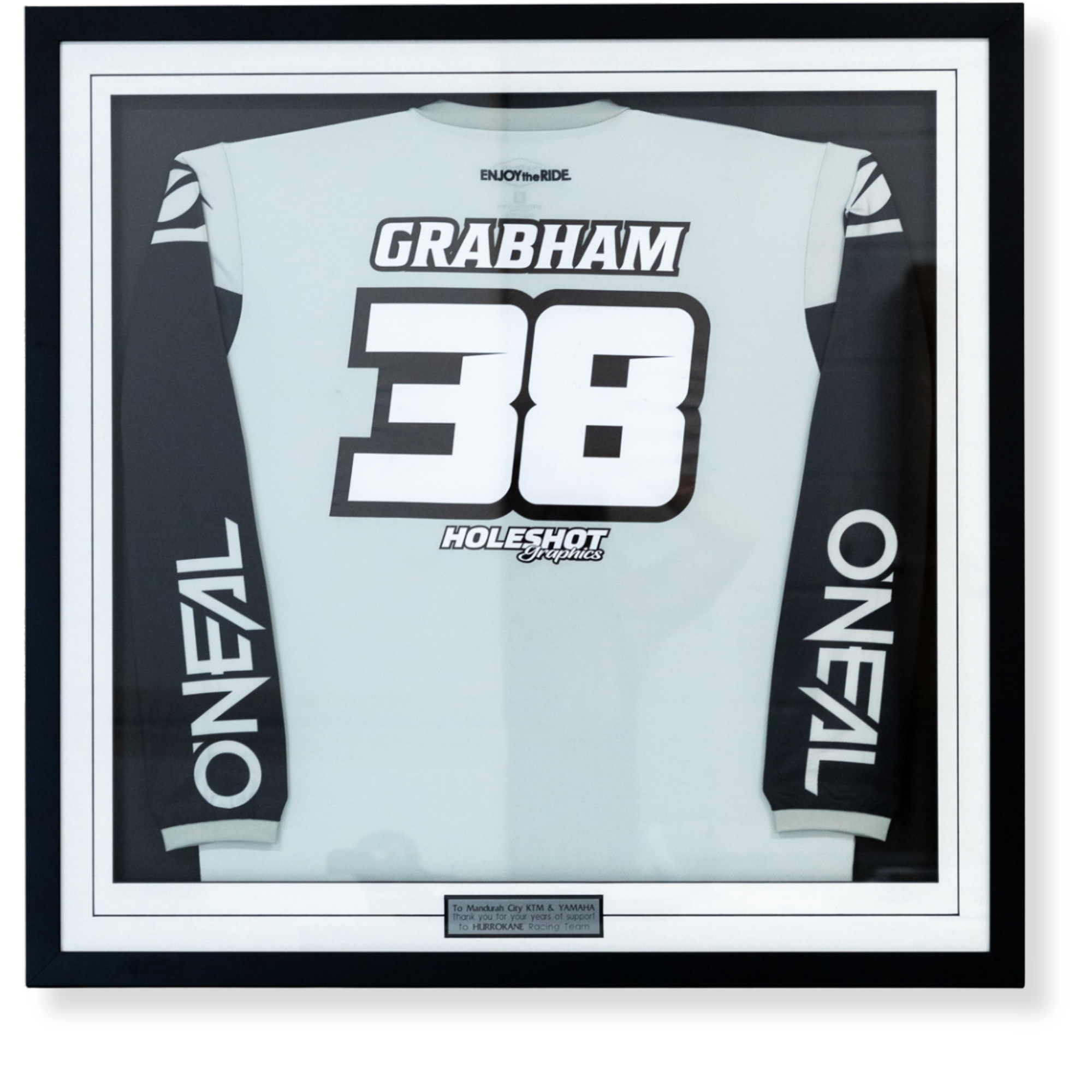Custom framed signed Hurricane Racing jersey display created to recognise team sponsorship and support.