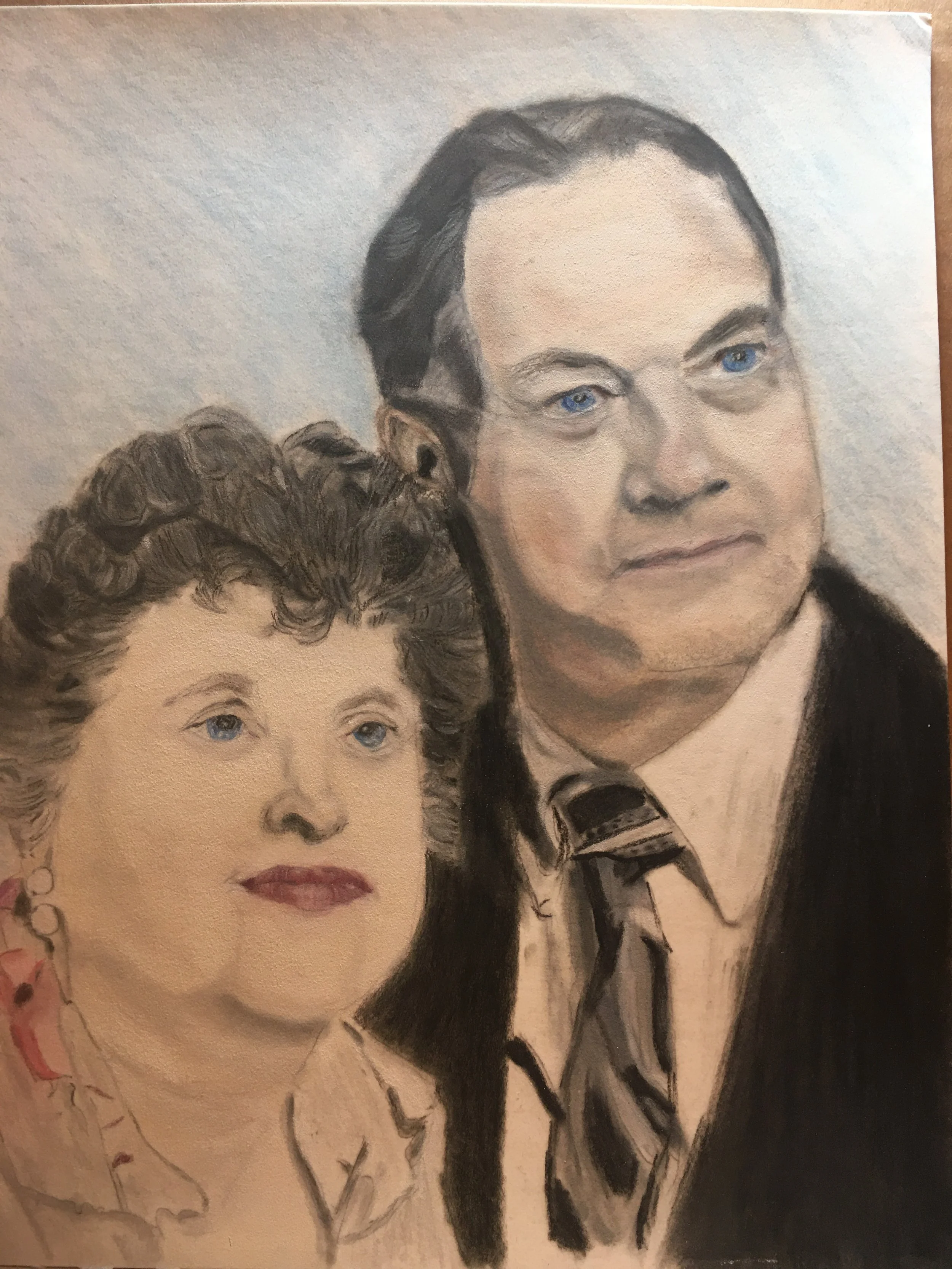 A watercolor painting of a woman with dark curly hair, blue eyes, and makeup, wearing earrings and a dress with floral details, alongside a man with dark hair, blue eyes, and a microphone.