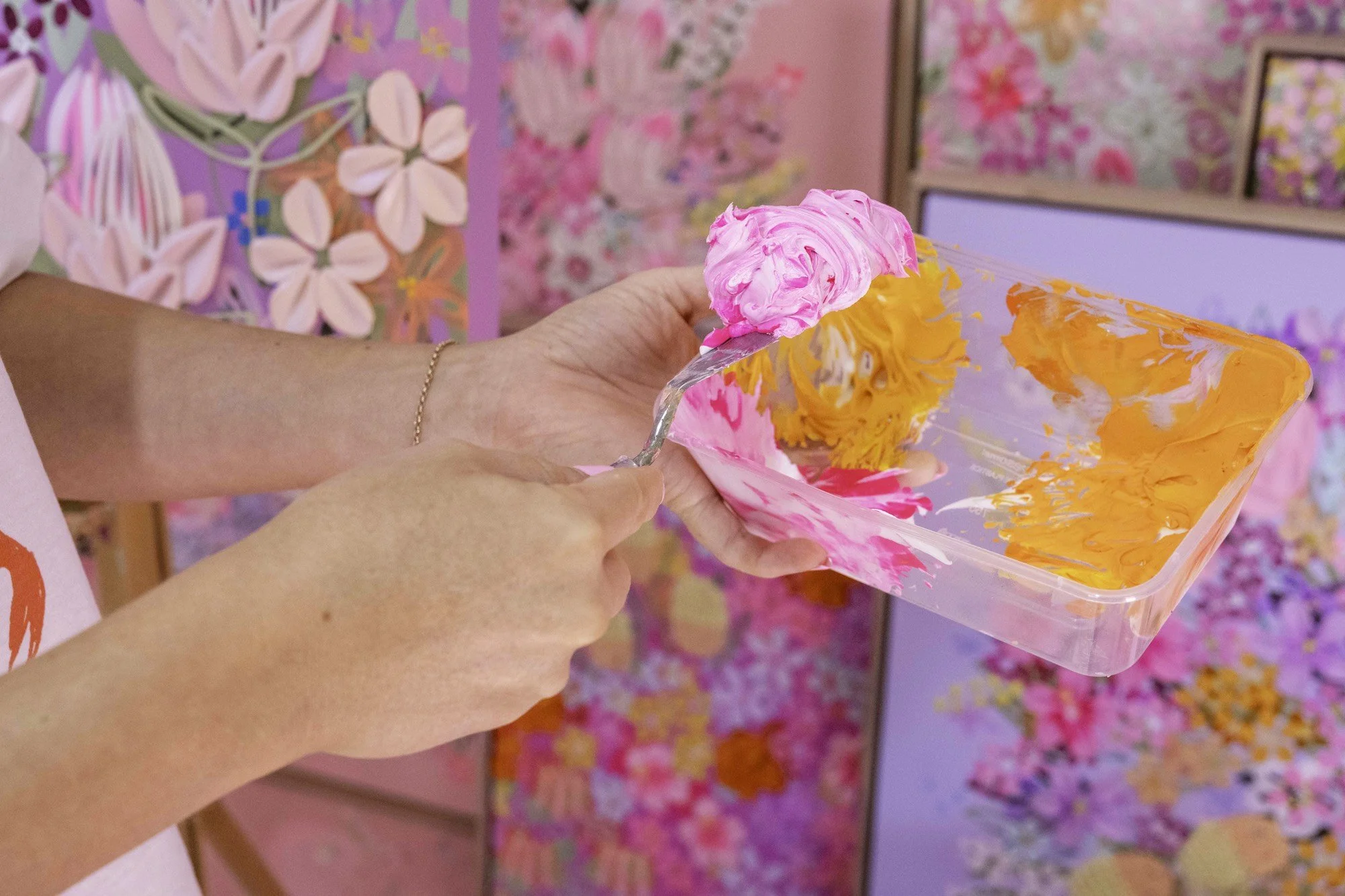 Artist Alex Mason using acrylic paint and polymer to create her textured artworks.