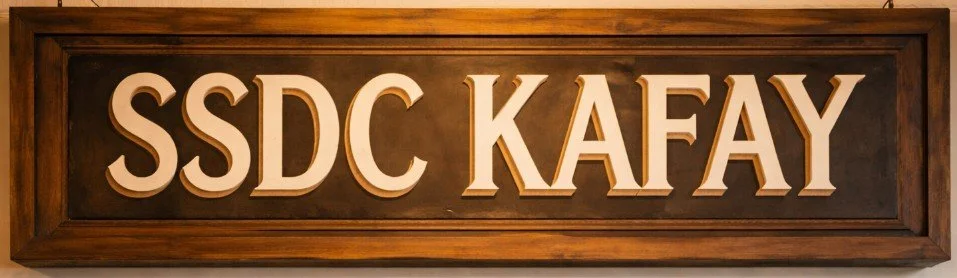 Wooden sign with the text SSDC KAFAY in large letters.