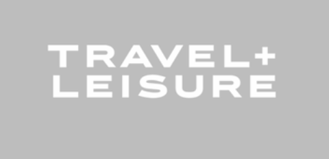 Text on gray background reading 'TRAVEL + LEISURE'