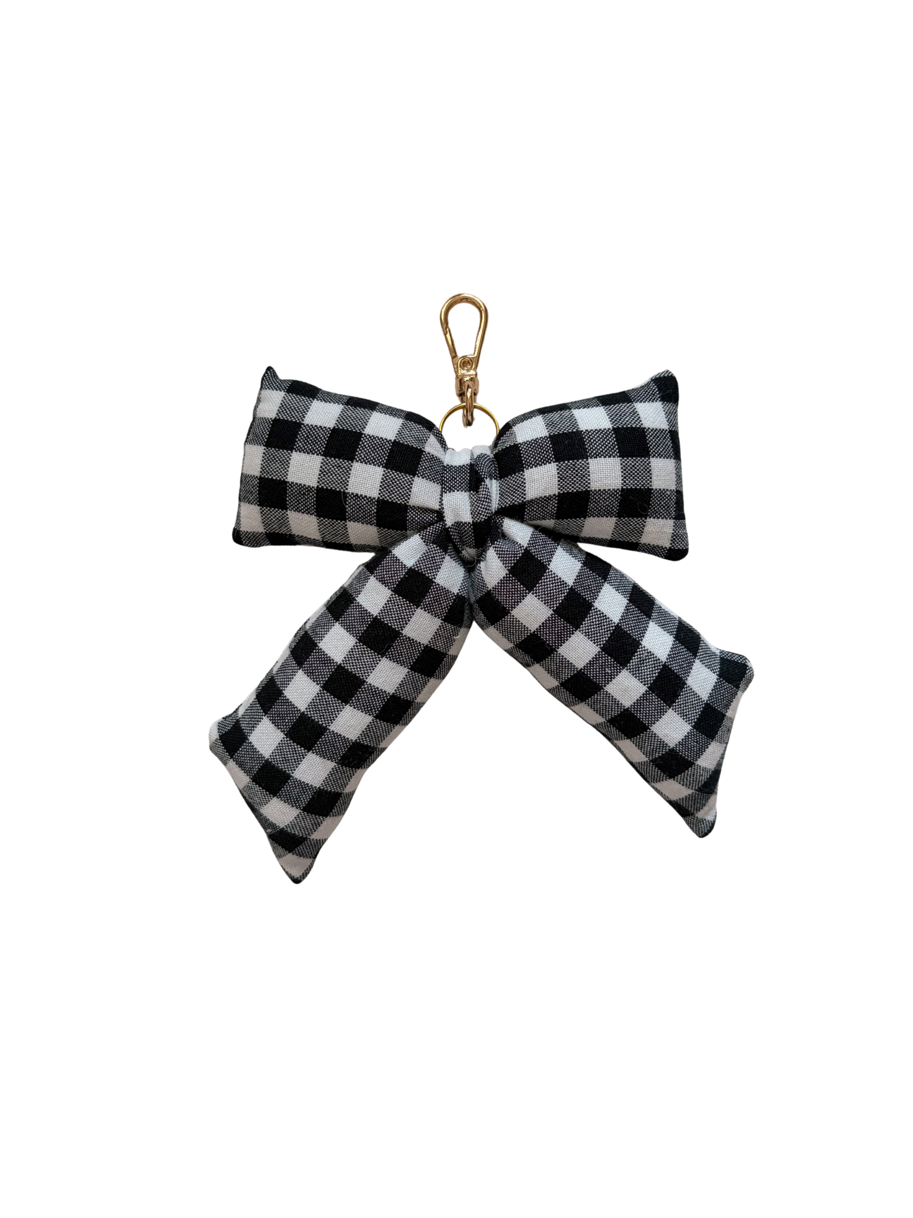 Midnight Gingham Puffy Bow Bag Charm in black and white gingham with a gold clasp on a white background