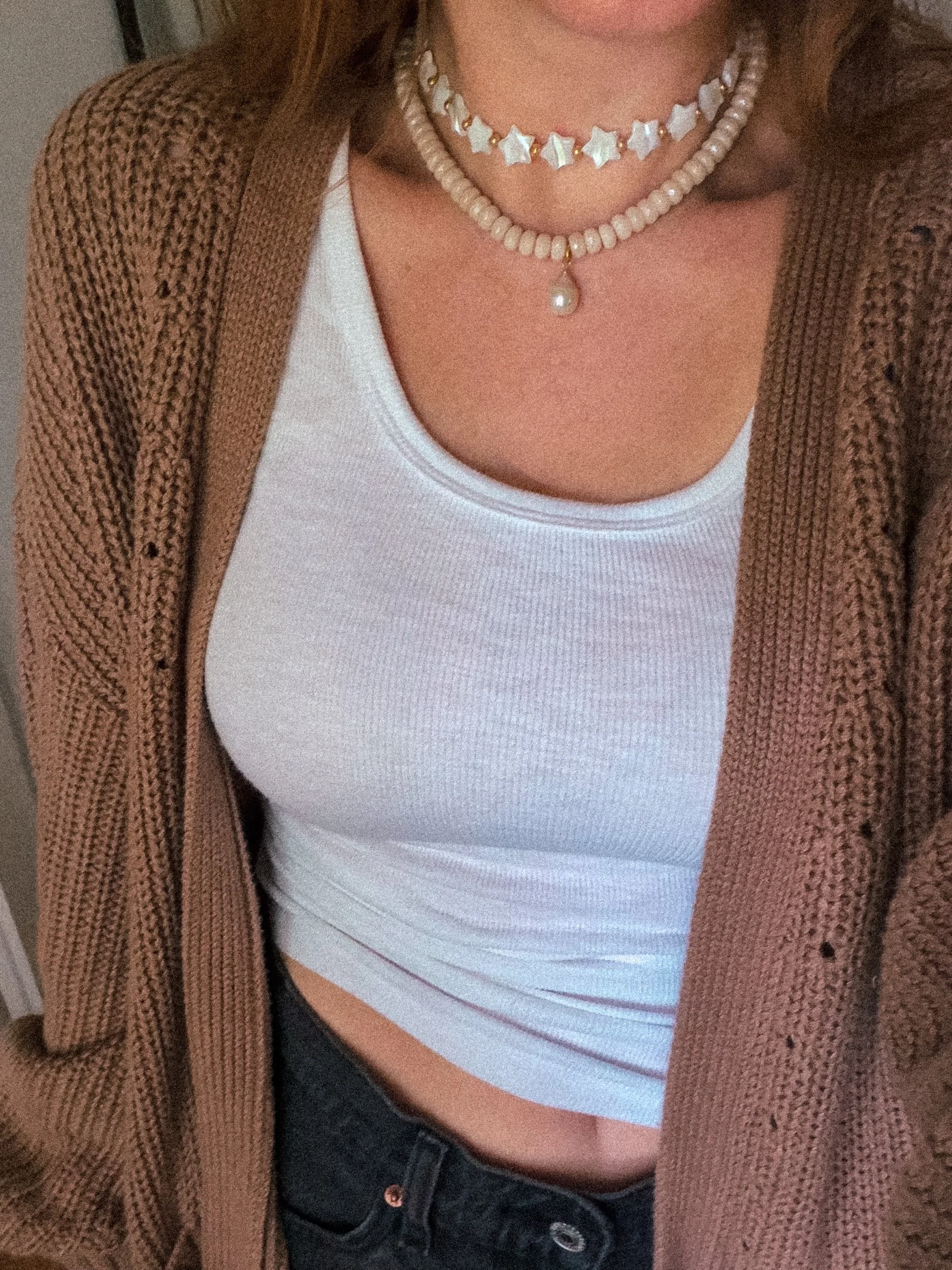 Pearl Drop Beaded Necklace worn with a white ribbed tank top and brown knit cardigan