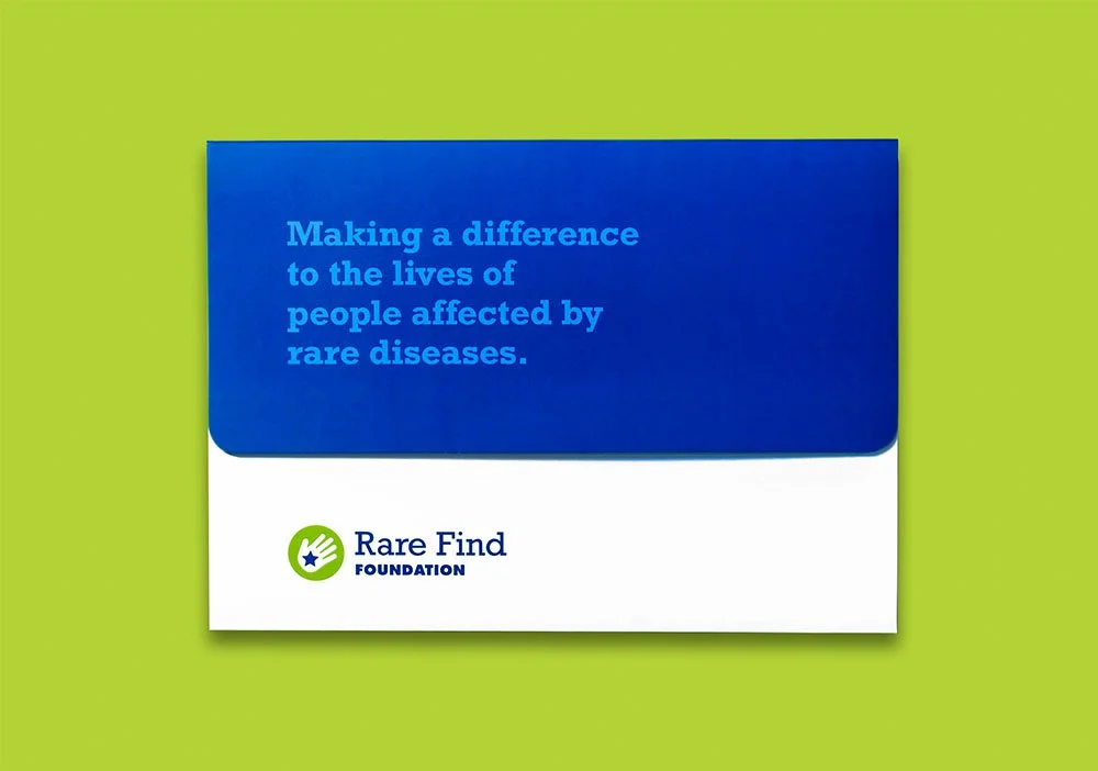 Blue and white promotional card for Rare Find Foundation with the message: "Making a difference to the lives of people affected by rare diseases," against a bright green background.