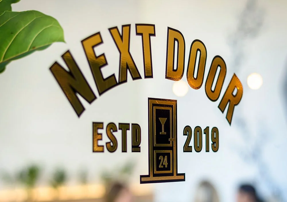 NEXT DOOR
