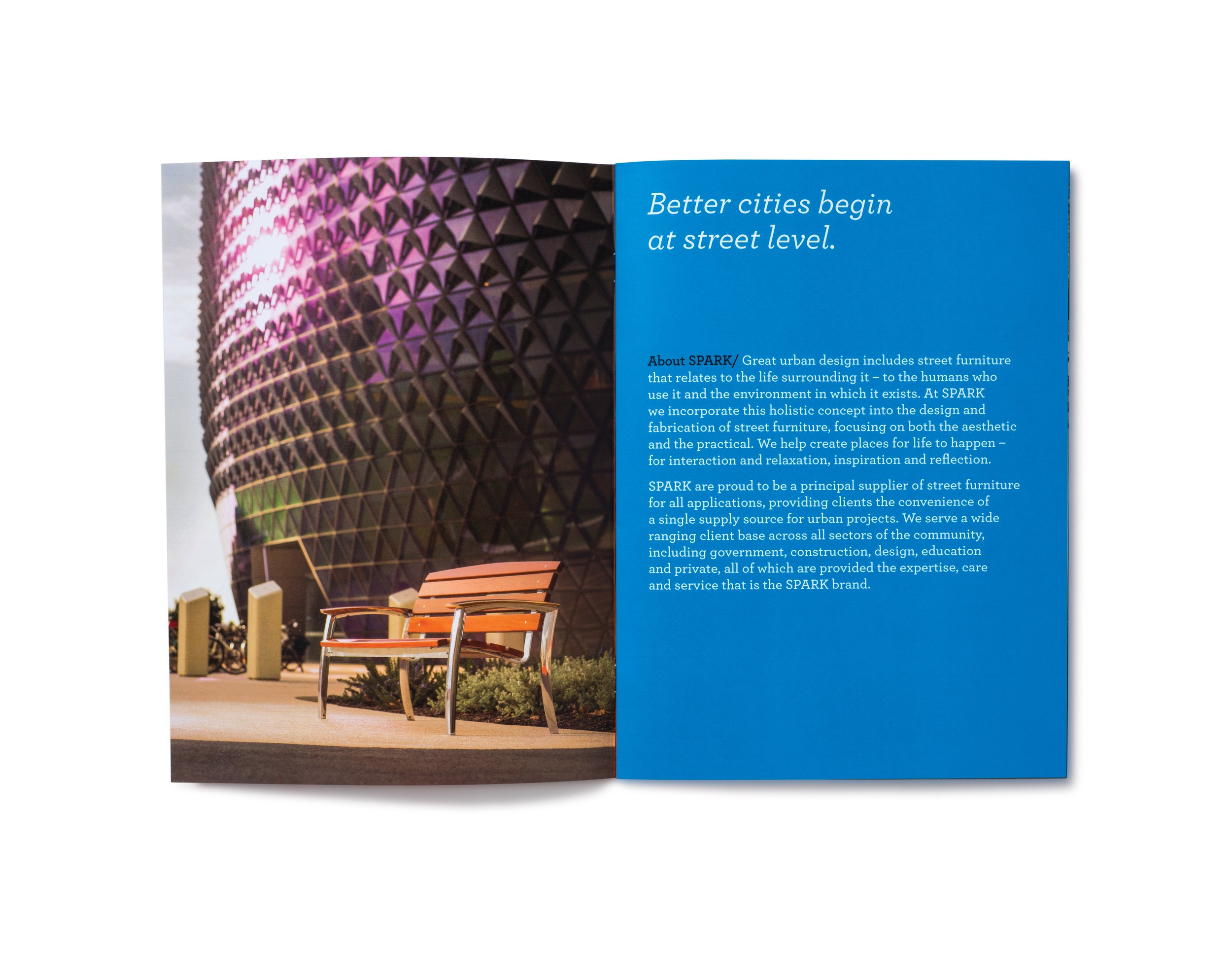 A brochure with an image of a modern building with a geometric design and a purple hue, along with blue text on the right side about urban design and street furniture.