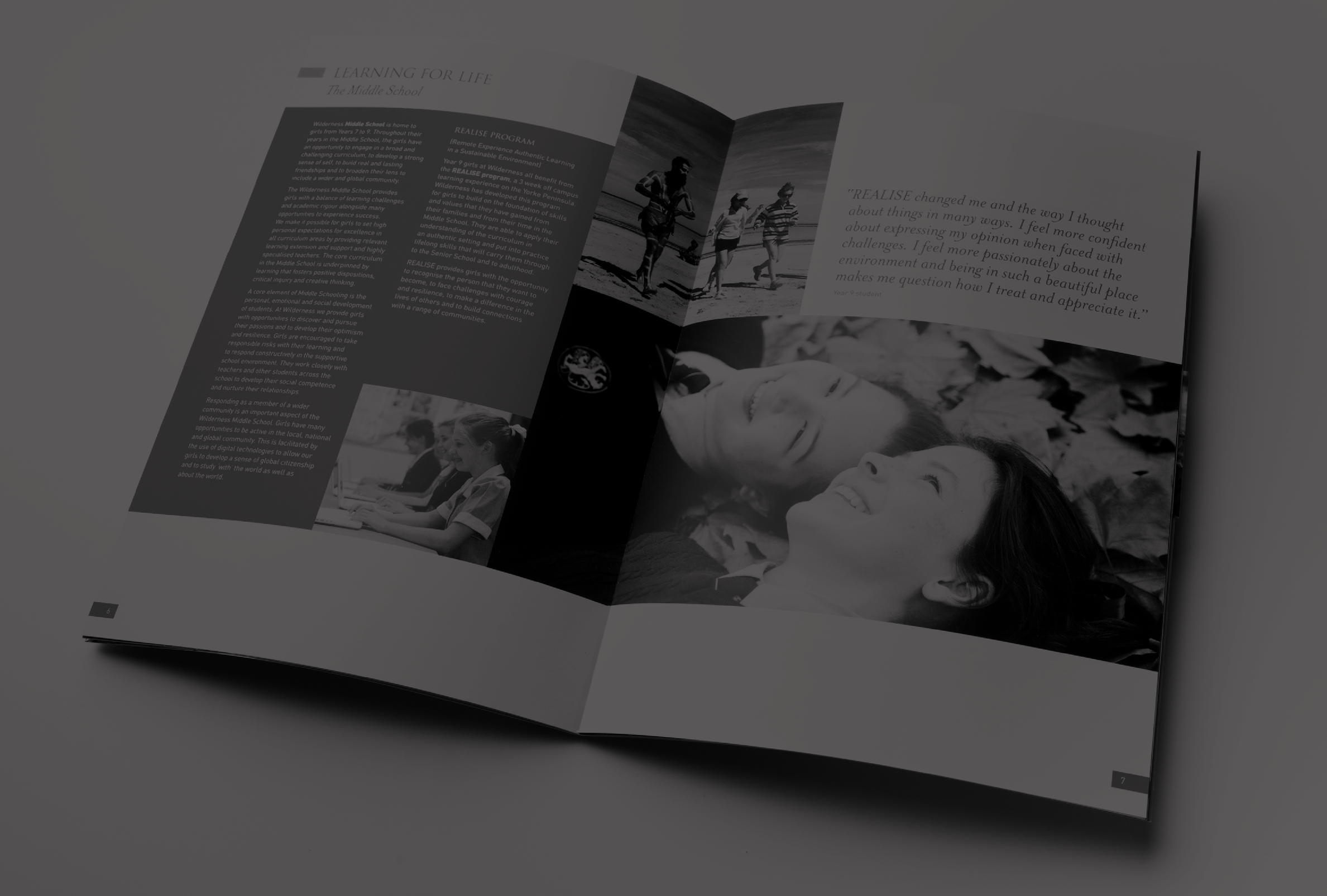 Open magazine with black and white photos of children and adults outdoors, including a group of girls walking and smiling, and a girl lying on fallen leaves.