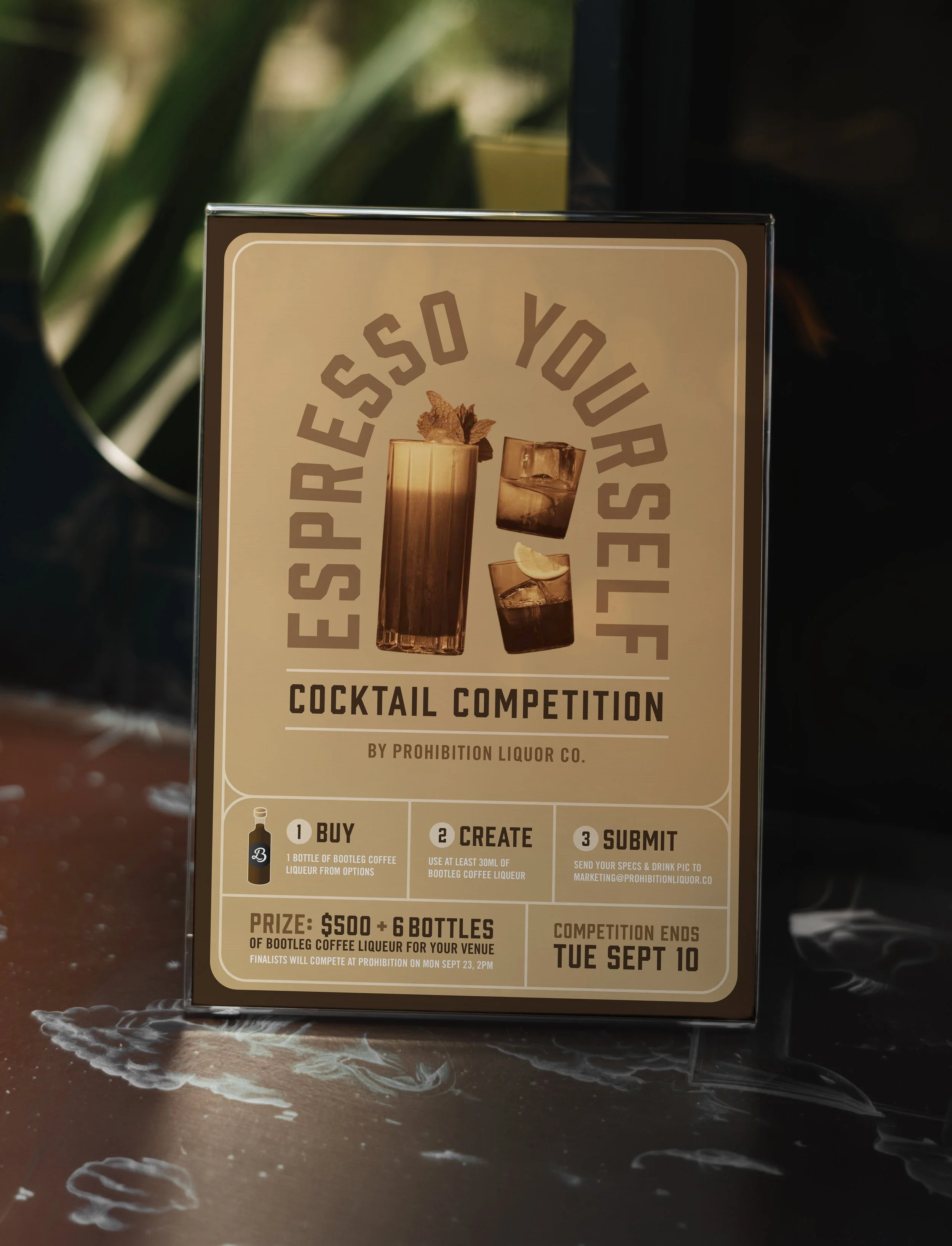 A promotional flyer for a cocktail competition by Prohibition Liquor Co., featuring instructions to buy, create, and submit drinks using Bootleg Coffee Liqueur with details of prizes and deadline.