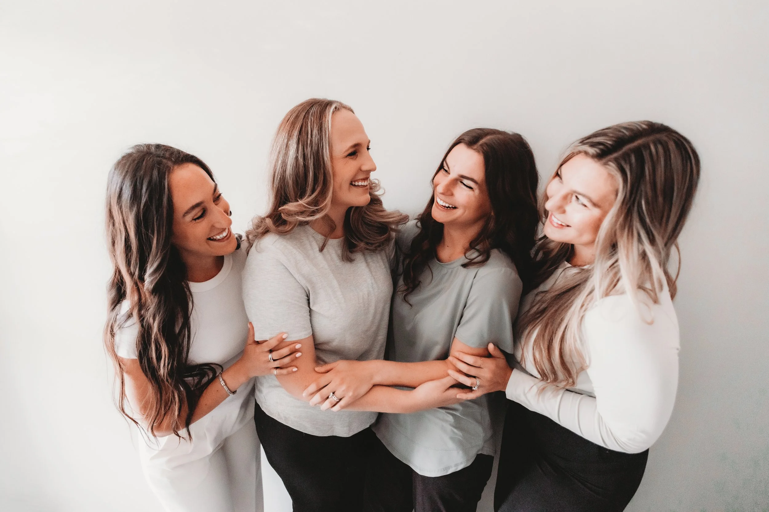 Full clinical team at Blue Door Holistic Therapy and Lactation laughing together in New Port Richey Florida