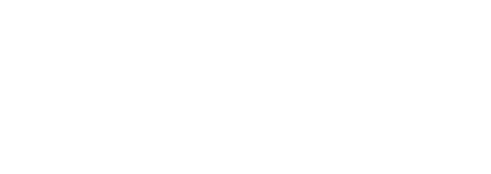 Close-up of a black and white logo with the letters TG and A.