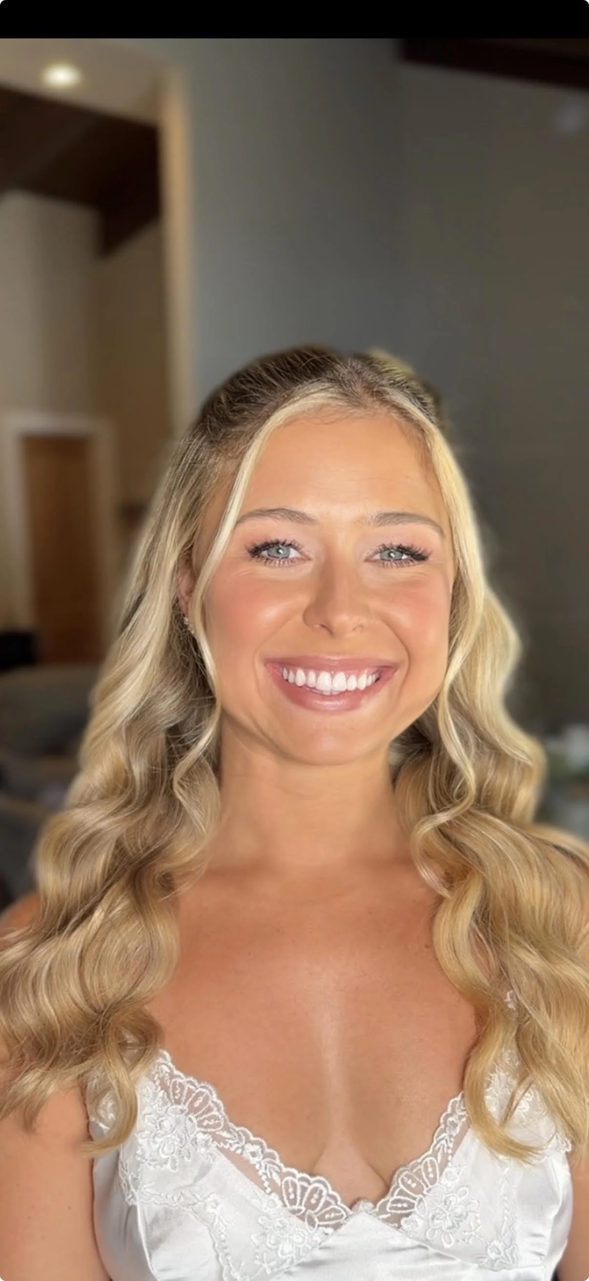 Bride with soft glam makeup and long Hollywood waves getting married at Rancho De Las Palmas in Moorpark, CA