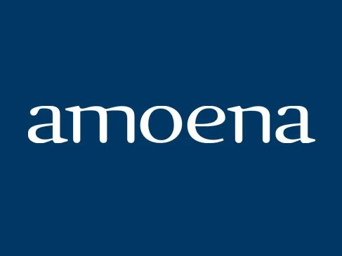 A dark blue background with the white word "amoena" in the center.