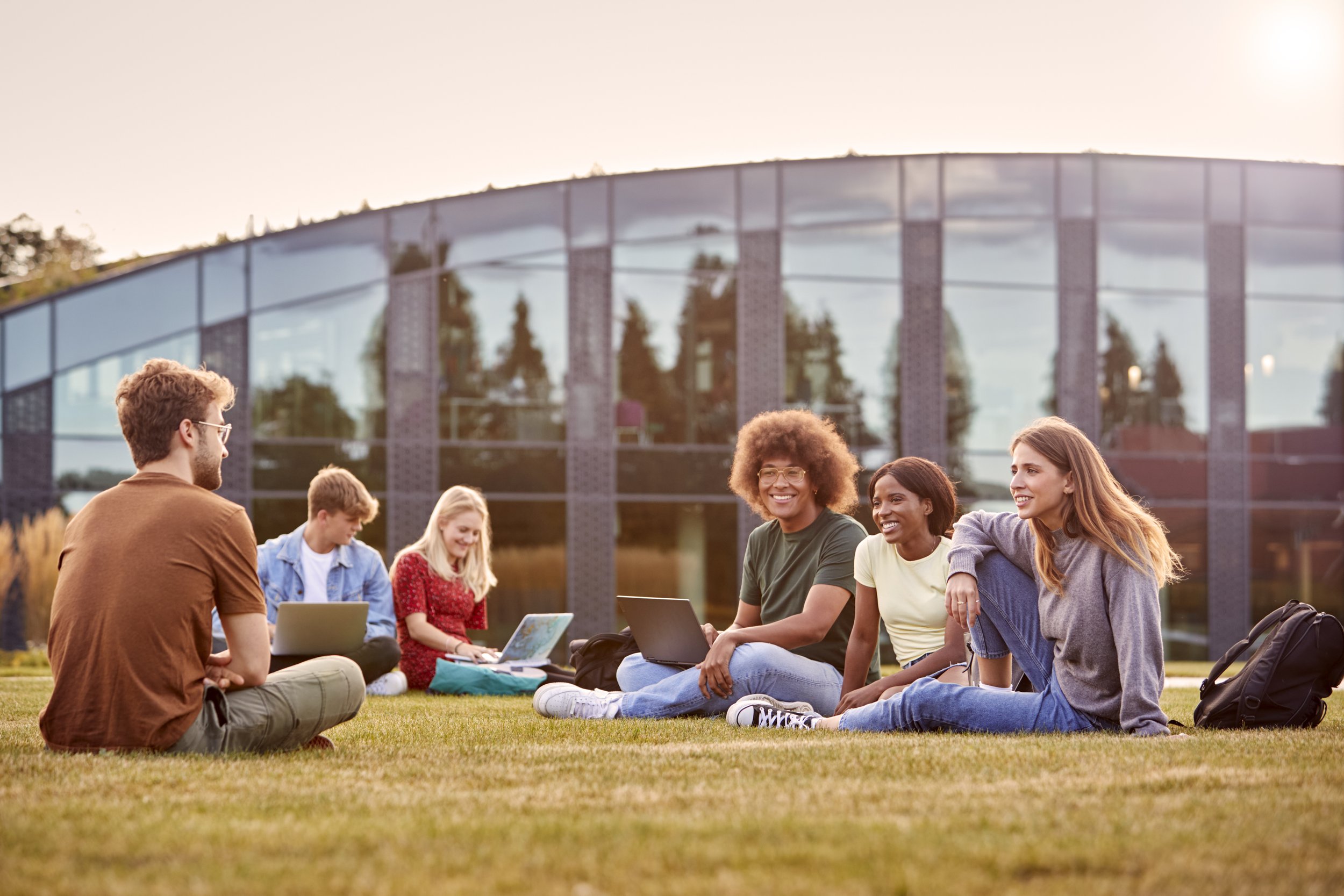 group-of-university-or-college-students-sit-on-gra-2023-11-27-04-54-50-utc.jpg