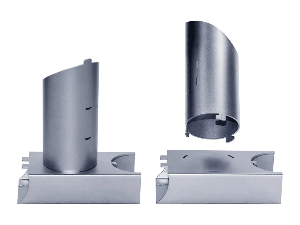 An exploded 3D CAD model view showing how multiple laser-cut parts interlock together seamlessly.