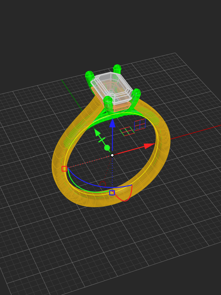 3D computer model of a ring with a large gemstone, displayed on a digital grid background, showing coordinate axes and manipulation handles.