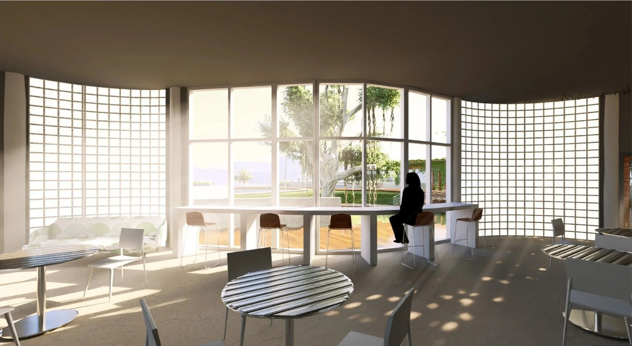 Interior of a modern room with large curved windows showing a tree and outdoor scenery, furnished with white chairs, round tables, and a person sitting at a high table.