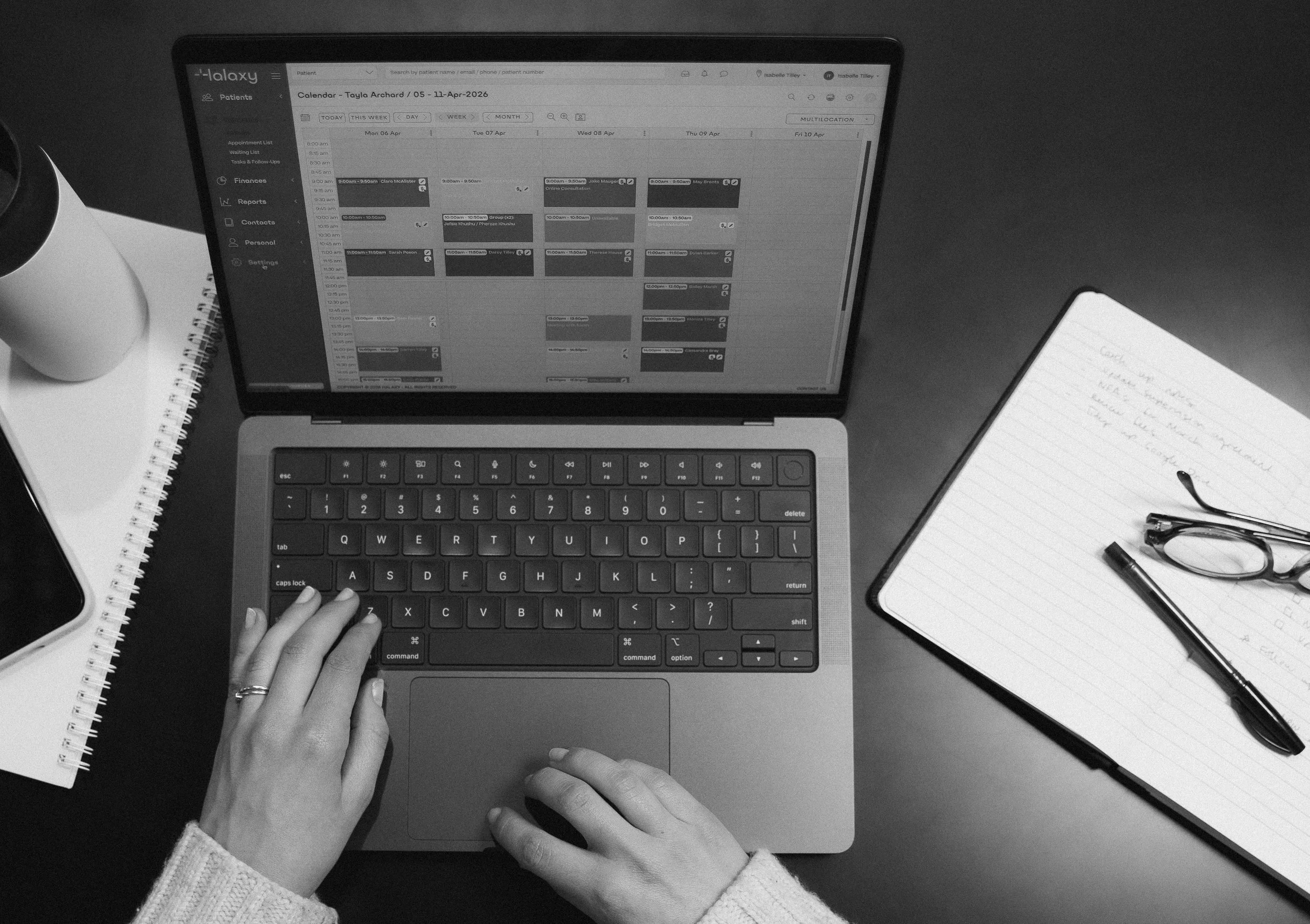 Halaxy practice management software displayed on laptop screen