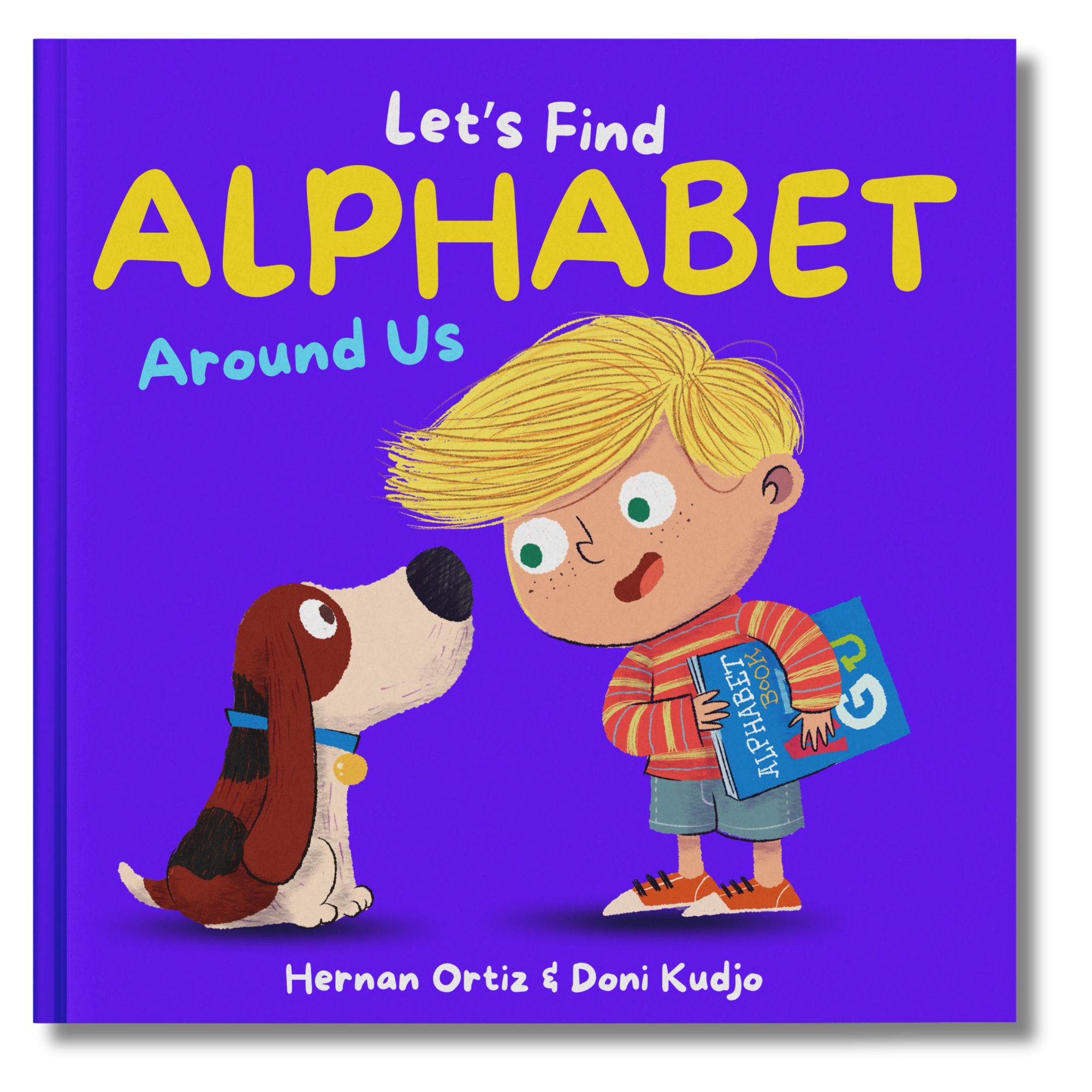 A children's book cover titled "Let's Find Aphabet Around Us" by Hernan Ortiz and Doni Kudjo, featuring an illustration of a boy with blond hair holding a book, and a dog looking up at him, against a purple background.