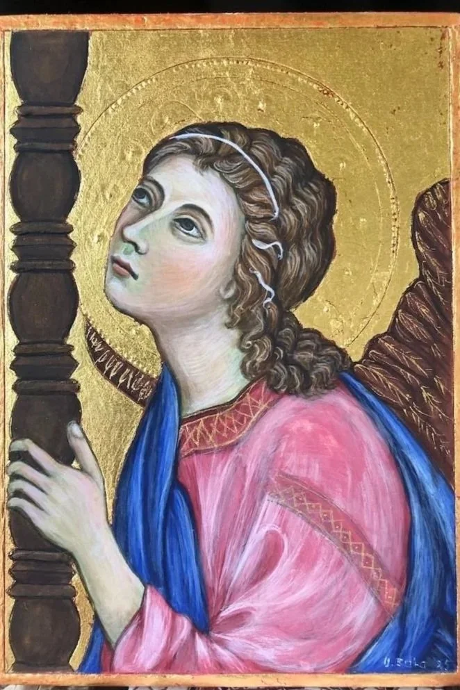 A religious icon-style painting of a woman with a golden halo, holding a wooden staff, wearing a pink and blue robe, with curly hair, against a gold background.