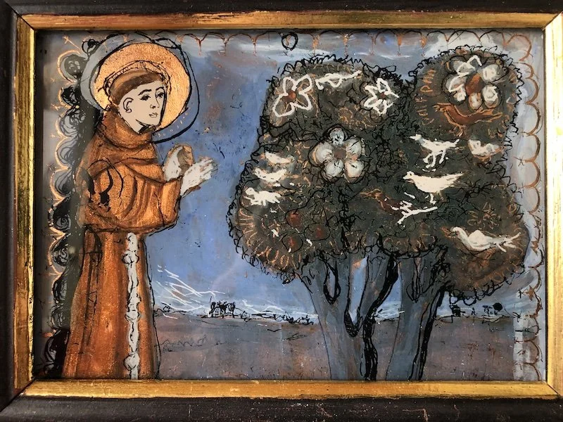 Reverse glass painting with metal leaf depicting St Francis of Assisi preaching to the birds , within the pastoral landscape of Umbria.