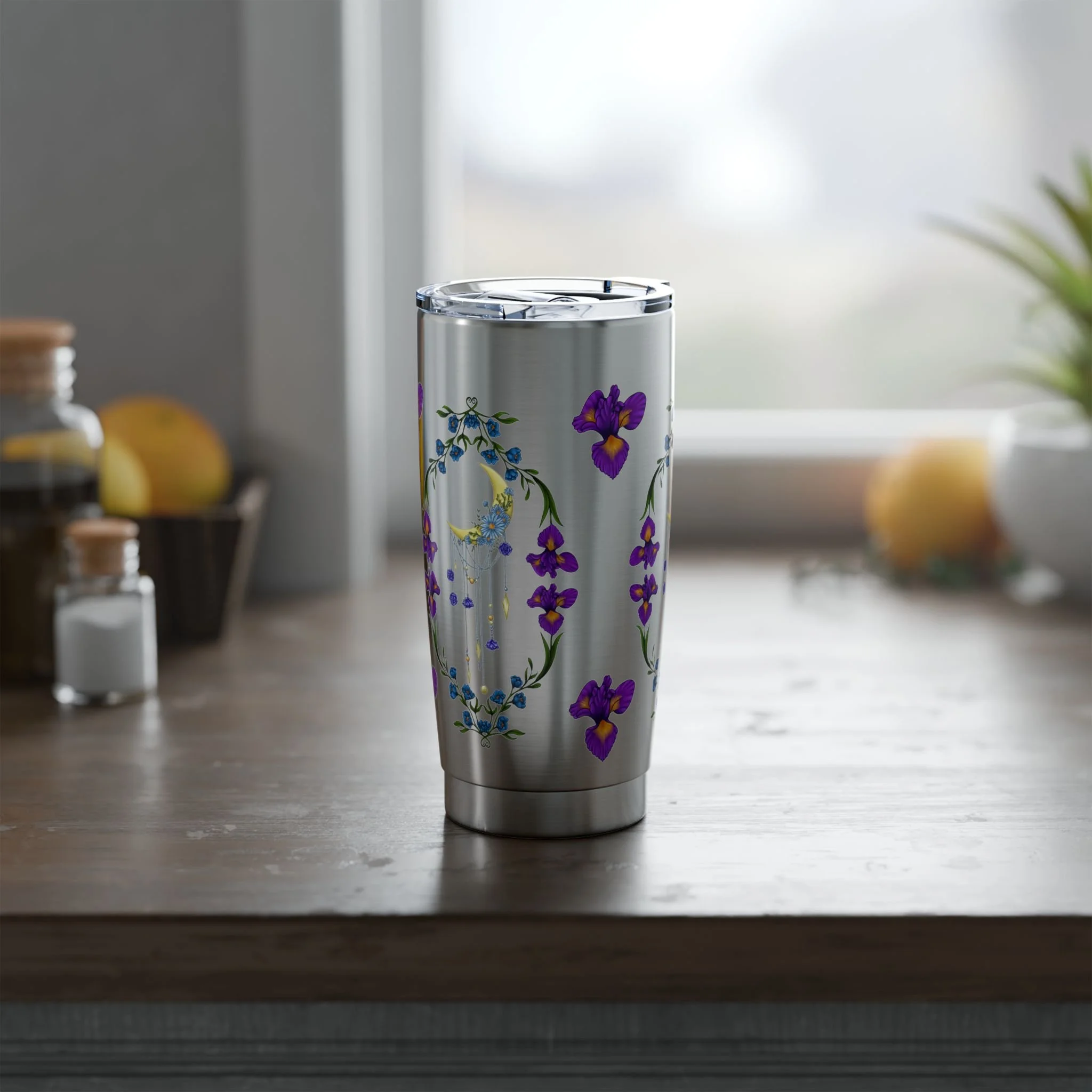 Hand-illustrated iris and crescent moon 20oz stainless steel tumbler. Insulated, spill-resistant, and built for people who want their everyday things to feel magical.